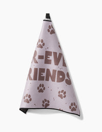 A light purple Geometry Fur Ever Friends Paw Towel with brown paw prints and partial -EVER FRIENDS text, made from ultra-absorbency Geoweave fabric, hangs from a black loop against a white background.