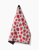 The Geometry Strawberry Sniff is a hanging Paw Towel featuring red strawberries and green leaves on white, made from ultra-absorbent Geoweave fabric.