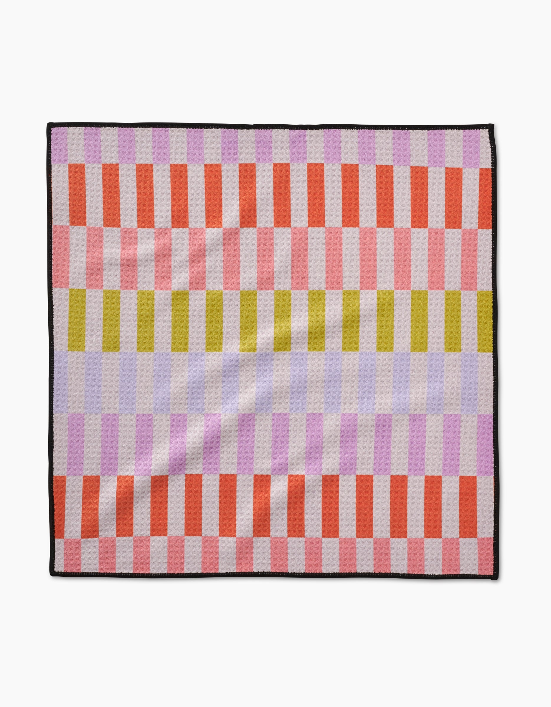 The Wag Wise by Geometry is a square blanket crafted from ultra-absorbent Geoweave fabric, showcasing red, pink, yellow, and lavender checkered stripes with a bold black border.