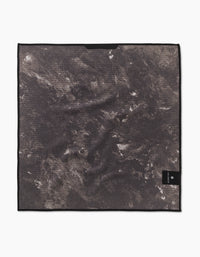 The Geometry Strawberry Sniff is a square, dark gray cleaning cloth made of ultra-absorbent Geoweave fabric with a marbled texture and a black label with white text in the bottom right, shown on a white background.