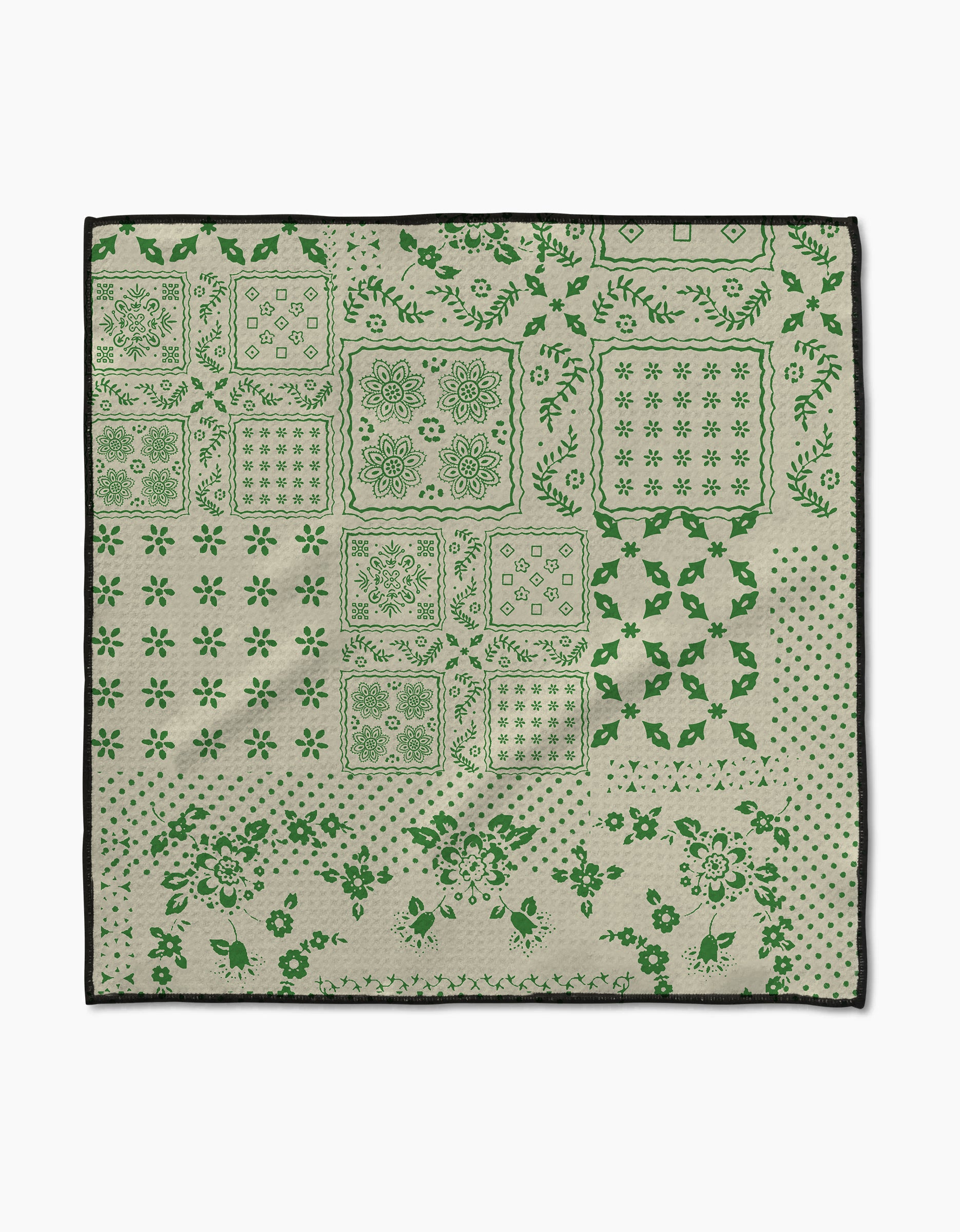 The Blossoming Bandanna Green by Geometry is a square beige cloth made from ultra-absorbent Geoweave™ fabric, featuring green floral, geometric, and dotted patterns in blocks with a black border. Ideal as a pet Paw Towel.