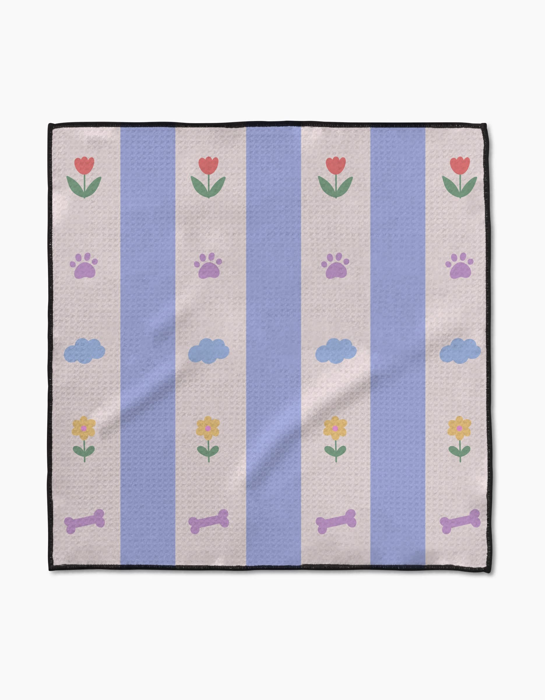 The Wagging Blooms pet towel by Letters By Shells features vertical light blue and beige stripes with red and yellow flowers, purple paw prints, blue clouds, and purple dog bones—ultra-absorbent and perfect for your furry friend.