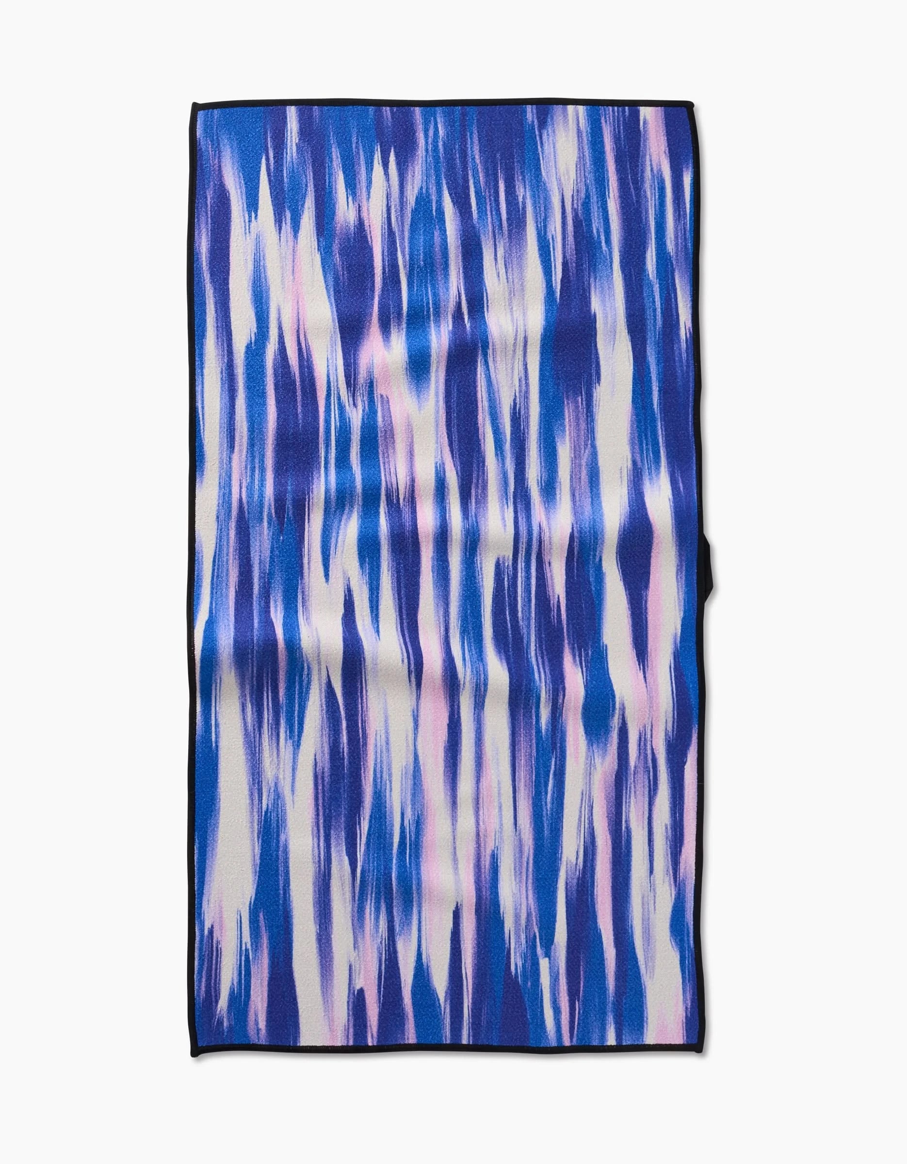 The GEOMETRY Blue Blast fitness towel features an abstract design of wavy blue, white, and purple streaks with a black border. Made from ultra-absorbent recycled materials.
