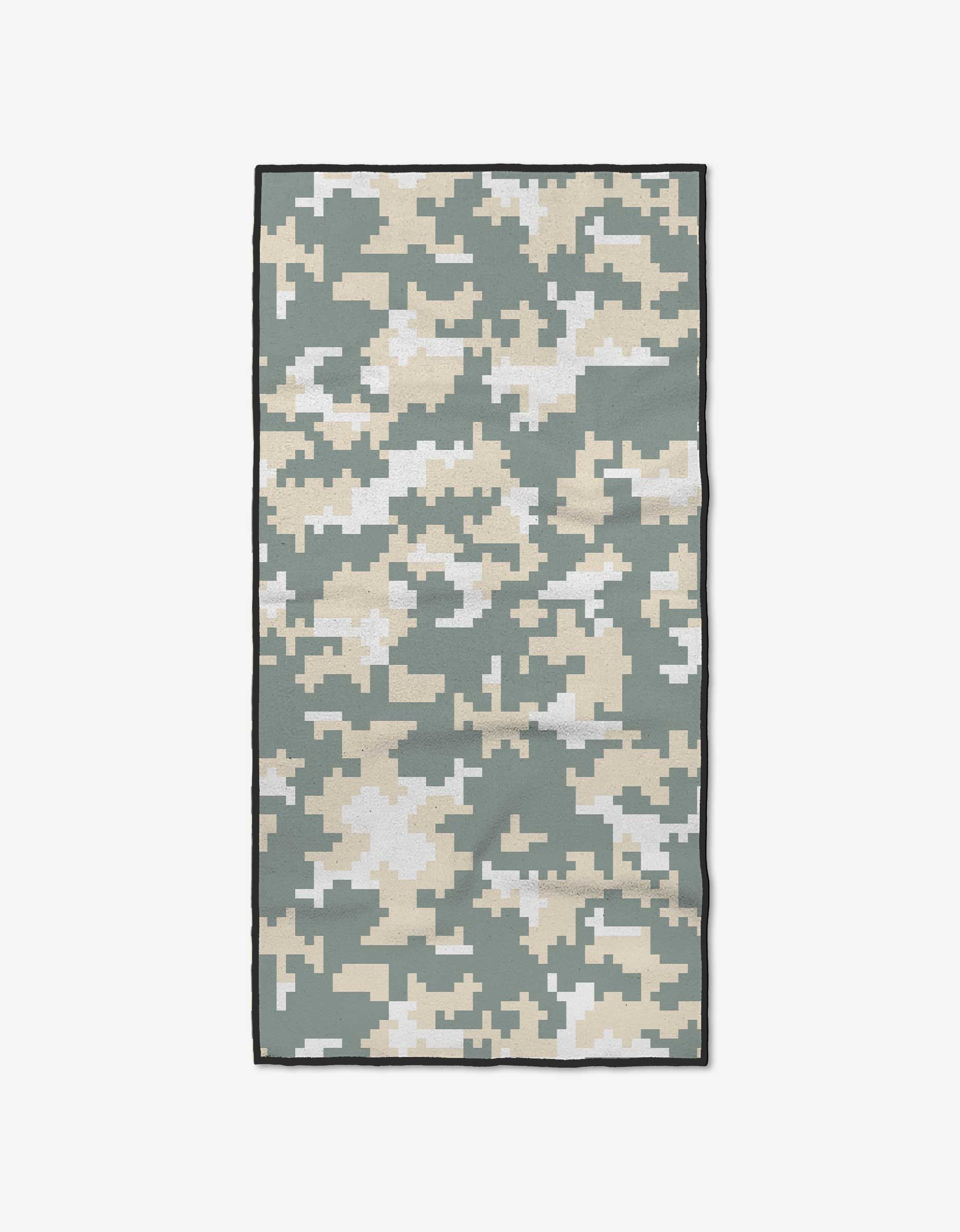 The GEOMETRY Digi Camo towel is rectangular, made from ultra-absorbent recycled materials, and features a green, beige, and white digital camouflage pattern with a slim black border. Shown flat on a white background.