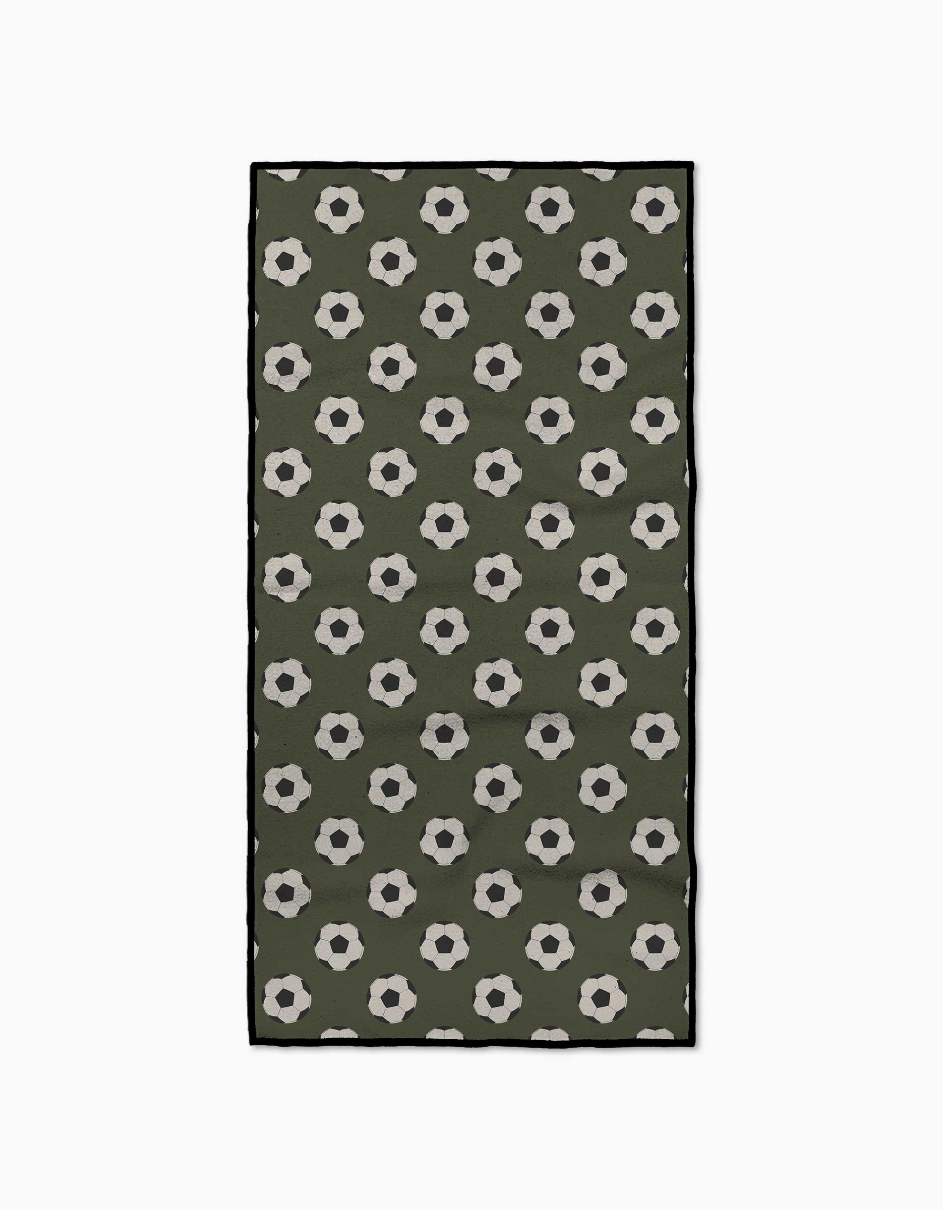Geometry’s Dribble is a rectangular green fitness towel made from ultra-absorbent recycled materials, featuring evenly spaced rows of black and white soccer balls.