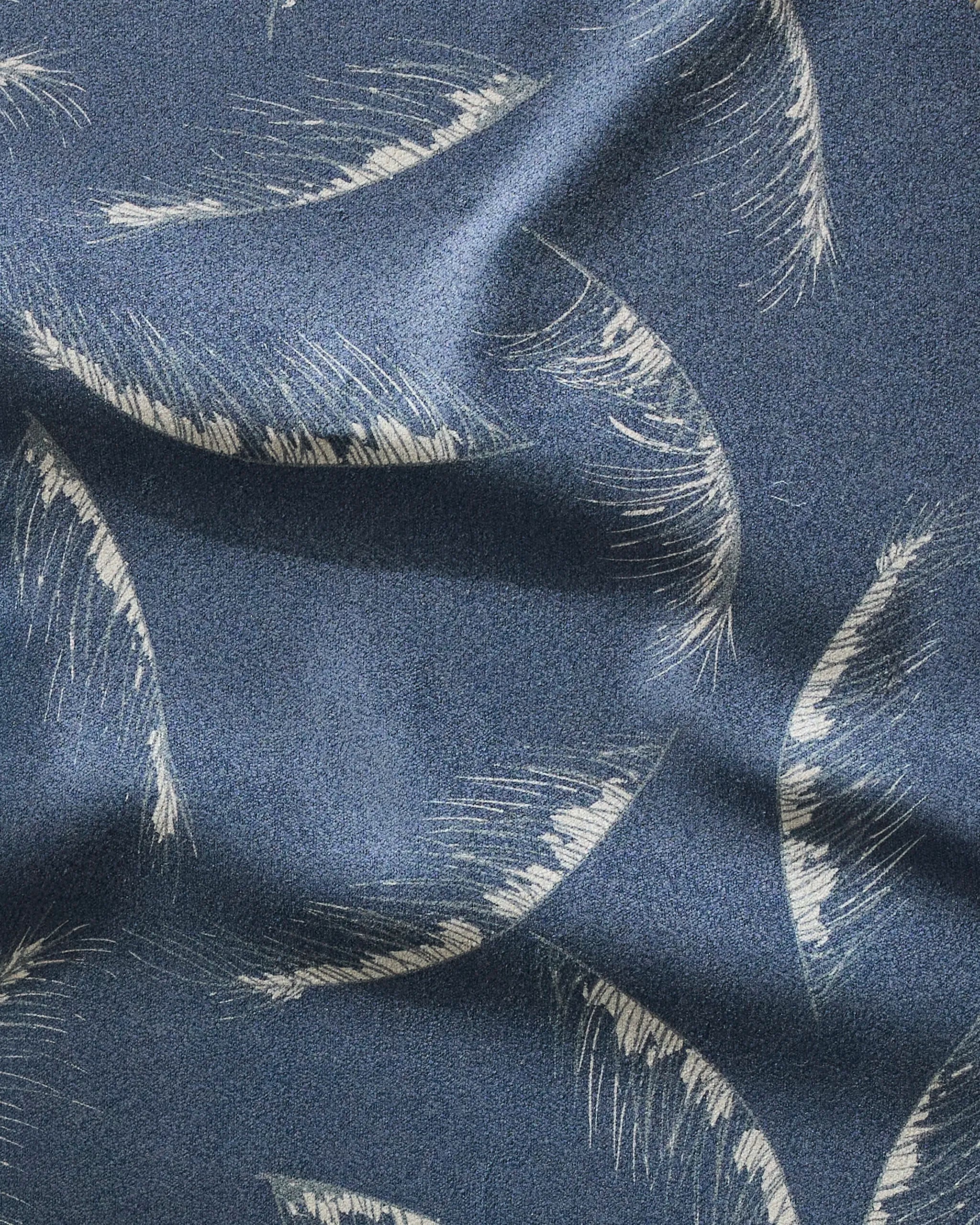 Due North Midnight by GEOMETRY: A blue towel with a subtle sheen and white brushstroke semicircles, made from recycled materials for style, ultra-absorbency, and sustainability.