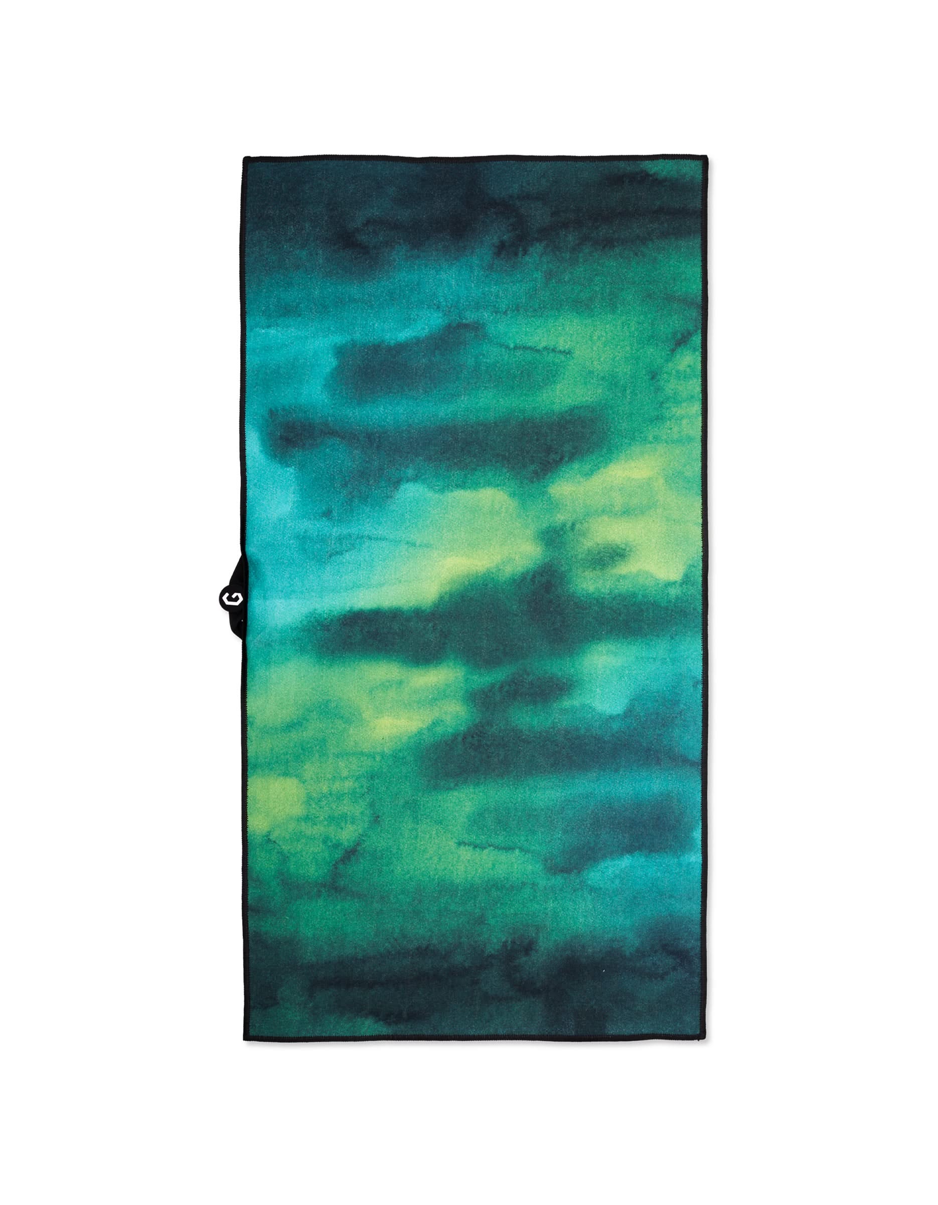 The GEOMETRY Magna - Greens is a rectangular fitness towel with a watercolor-style blue, green, and yellow pattern. Made from recycled materials, it features a black border and a small black loop on one side.