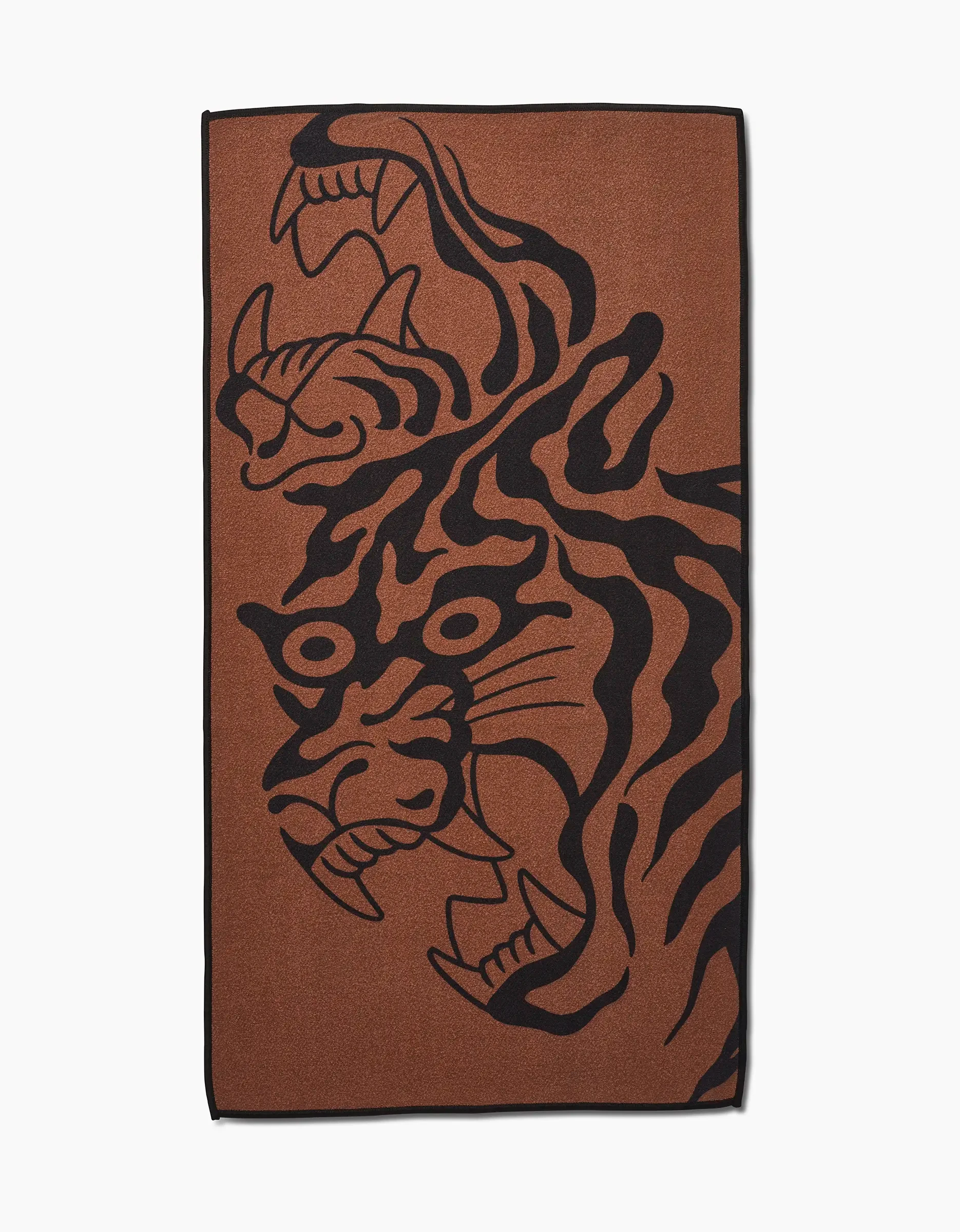 The Panther In Brown by Cole Strem is a rectangular brown fitness towel crafted from recycled materials, featuring a bold black outline of a panther’s head and upper body with striking stripes and bared teeth.