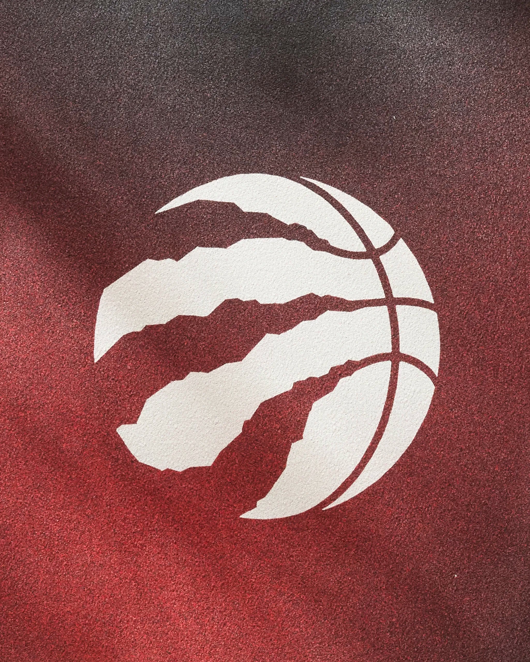 The Raptors Fade towel by NBALAB x Geometry features a white basketball logo with claw marks on a red and black gradient—ideal inspiration for your quick-drying workout or NBA fitness towel collection.