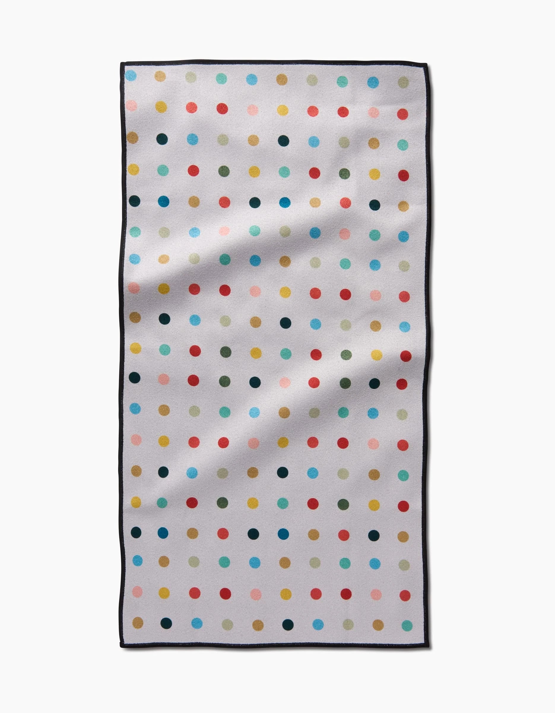 The Retro Dot Fitness Towel by Elizabeth Edwards features a white background with rows of colorful polka dots, a black border, and is made from ultra-absorbent recycled materials.