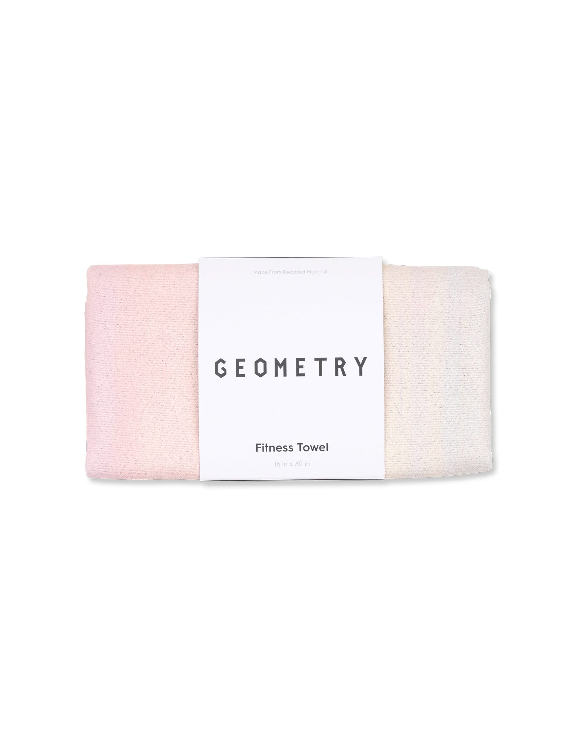 A folded pastel fitness towel made from recycled materials features soft pink and cream gradients and a white label reading Magna - Sunrise on the front. Brand: GEOMETRY.