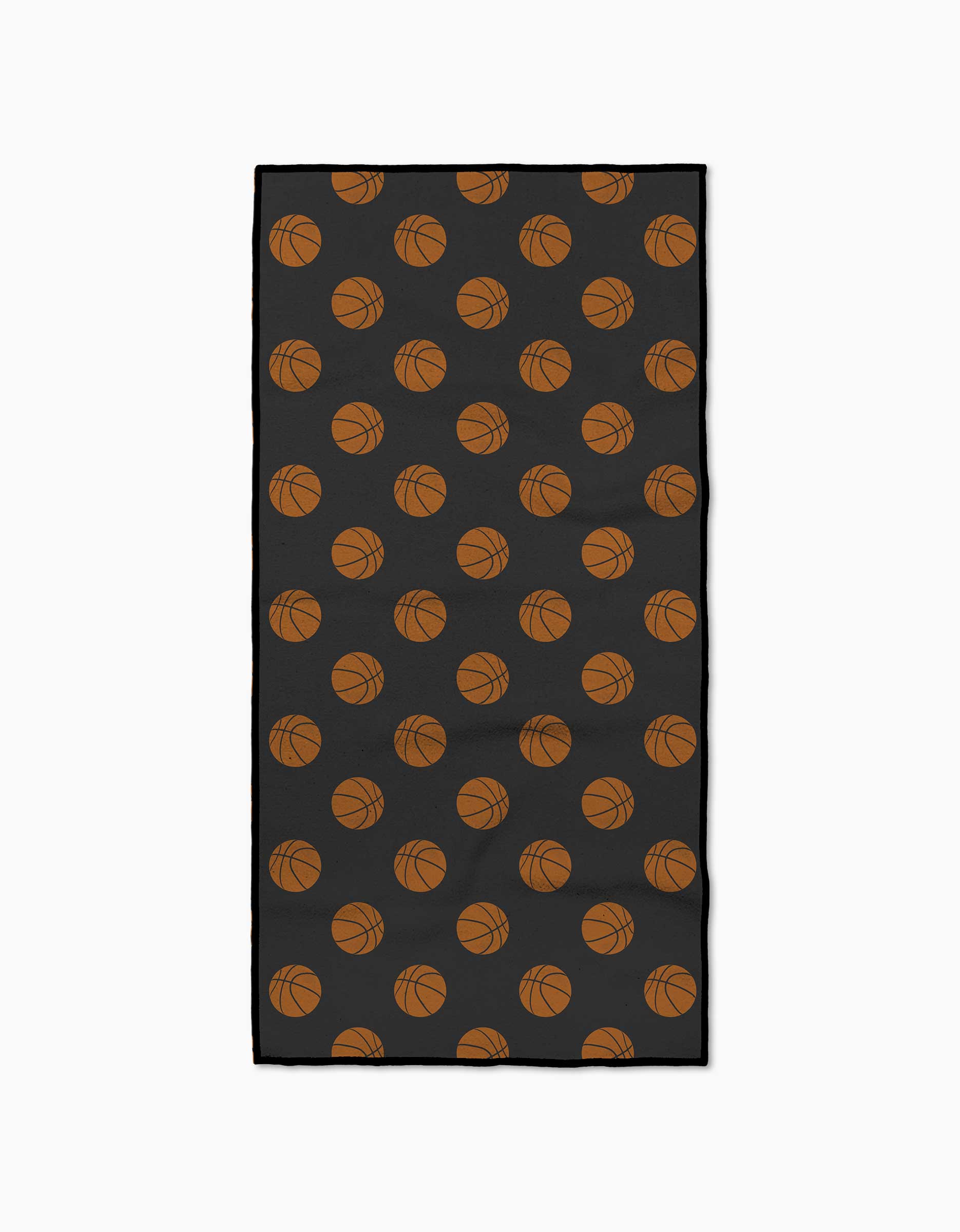 The Geometry Swish is a rectangular black fitness towel featuring a repeating orange basketball pattern, made from recycled materials and designed to be ultra-absorbent.