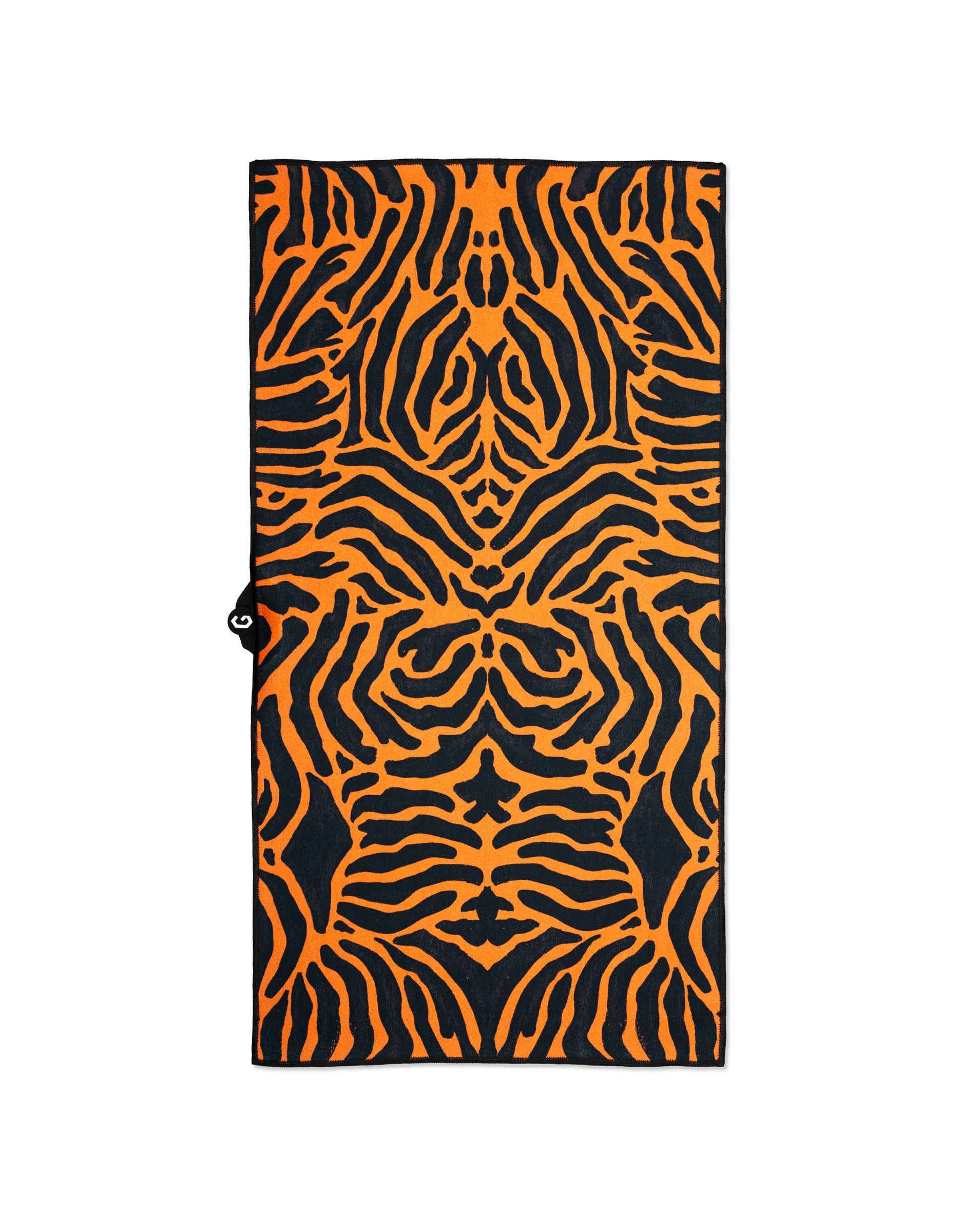 GEOMETRY’s Magna - Tiger towel features a bold, symmetrical orange and black tiger stripe design, made from recycled materials for ultra-absorbency. Shown laid flat on a white background.