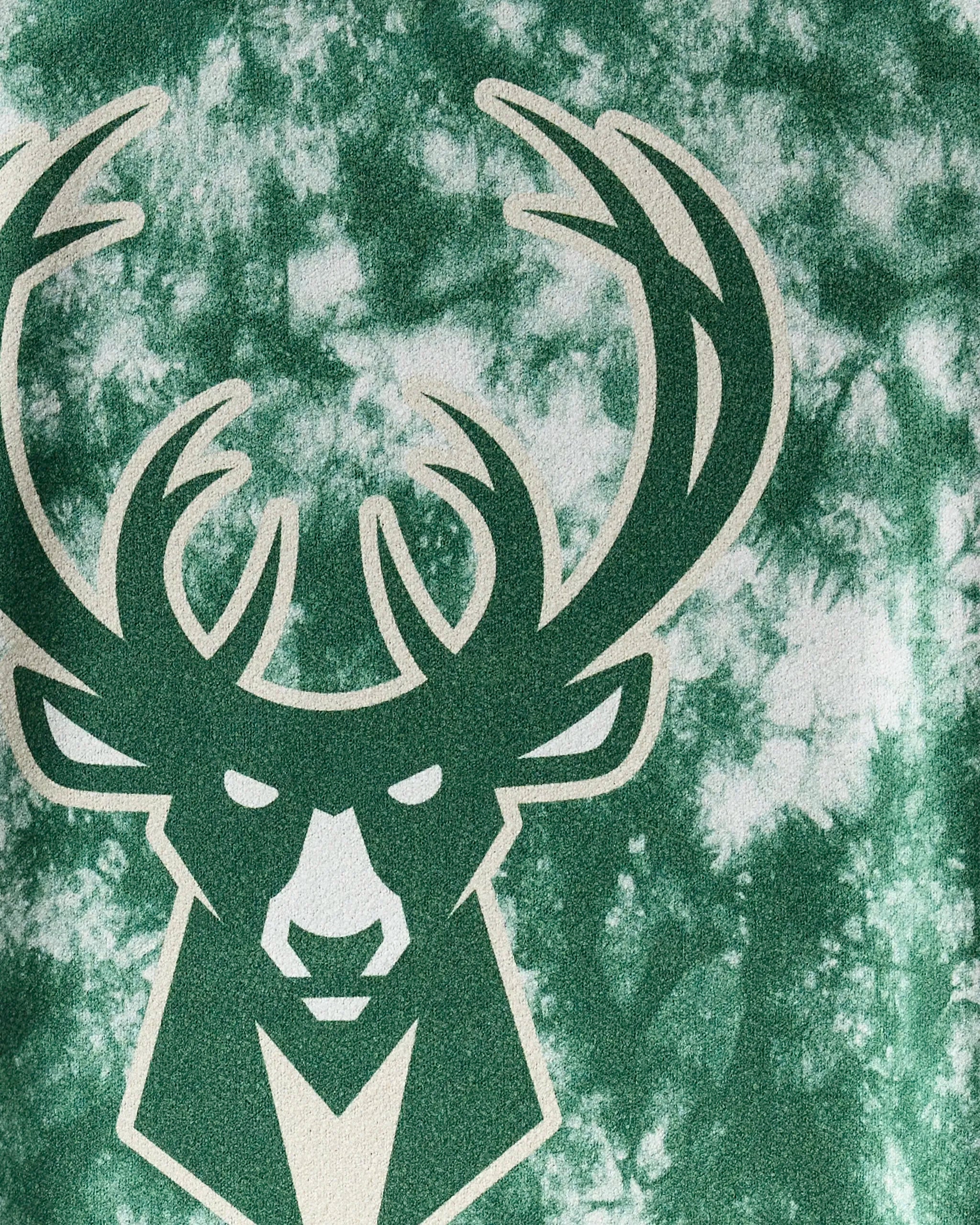 The NBALAB x Geometry Bucks Flash fitness towel features a stylized deer head with large antlers in white and green on a green and white tie-dye background, creating a sustainable gym essential for any workout.