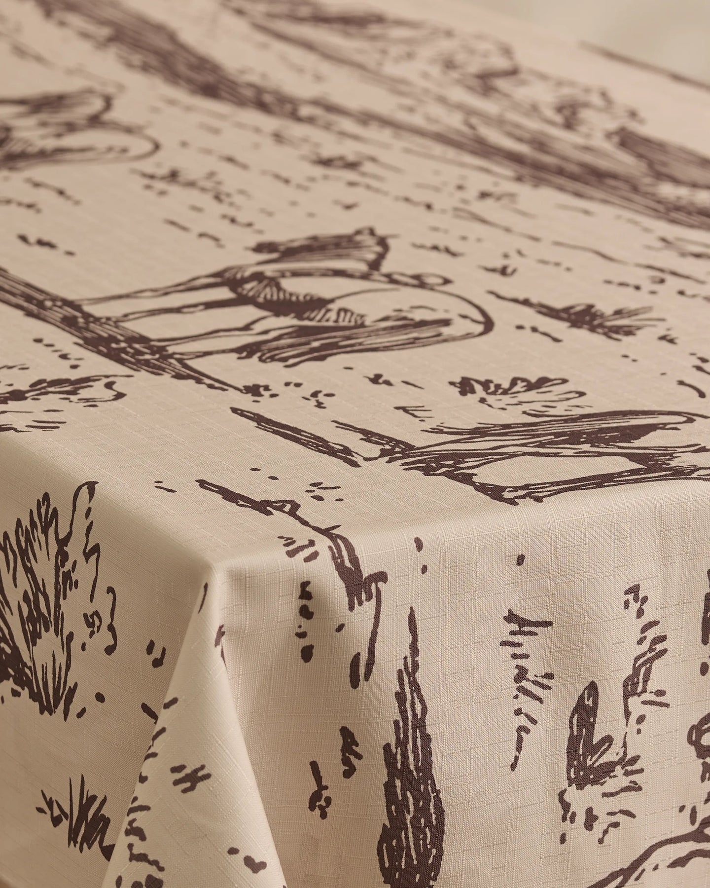 The Geometry Western Scene tablecloth, in beige with a dark brown scenic line drawing of birds and reeds, offers a textured, stylish, and stain-resistant design—practical for everyday use.