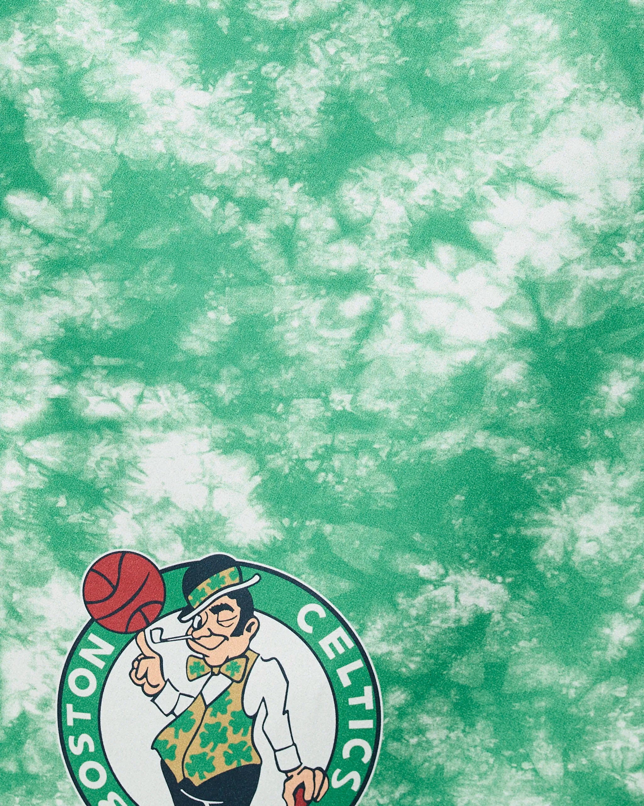 The Geometry Celtics Flash features a Boston Celtics logo with a leprechaun spinning a basketball in the bottom left corner, set against a stylish green and white tie-dye background.