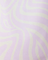 Abstract image with wavy, flowing lines in light lavender and off-white creates a soft zebra-like pattern, evoking the smooth design of GEOMETRY’s Dizzy Lilac Micro-loop Beach Towel. Gentle curves blend seamlessly across the surface.