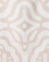 White brushstroke-like lines form symmetrical, curved shapes on light pink, creating a geometric, organic pattern—perfect for the Tribal beach towel by GEOMETRY, made from quick-drying recycled materials.