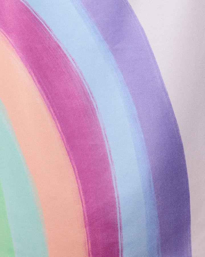 A close-up of the Violet Rainbow by GEOMETRY, showing soft, blended pastel arcs on a light background—perfect inspiration for a quick-drying beach towel made from recycled materials.
