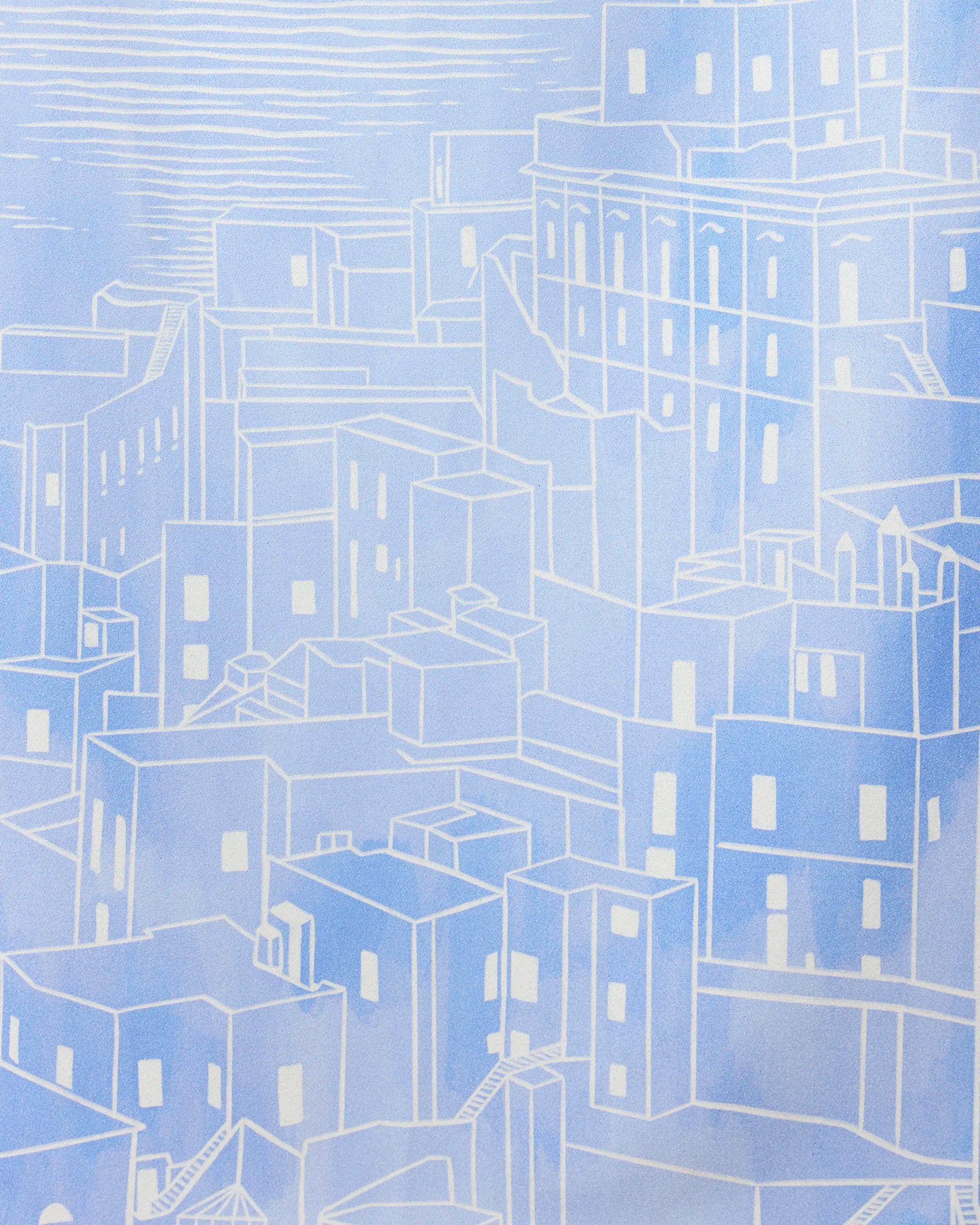 Abstract illustration of a cityscape in blue and white geometric shapes, reminiscent of the simple lines featured on the Amalfi Coast towel by GEOMETRY, set against a lightly textured sky.