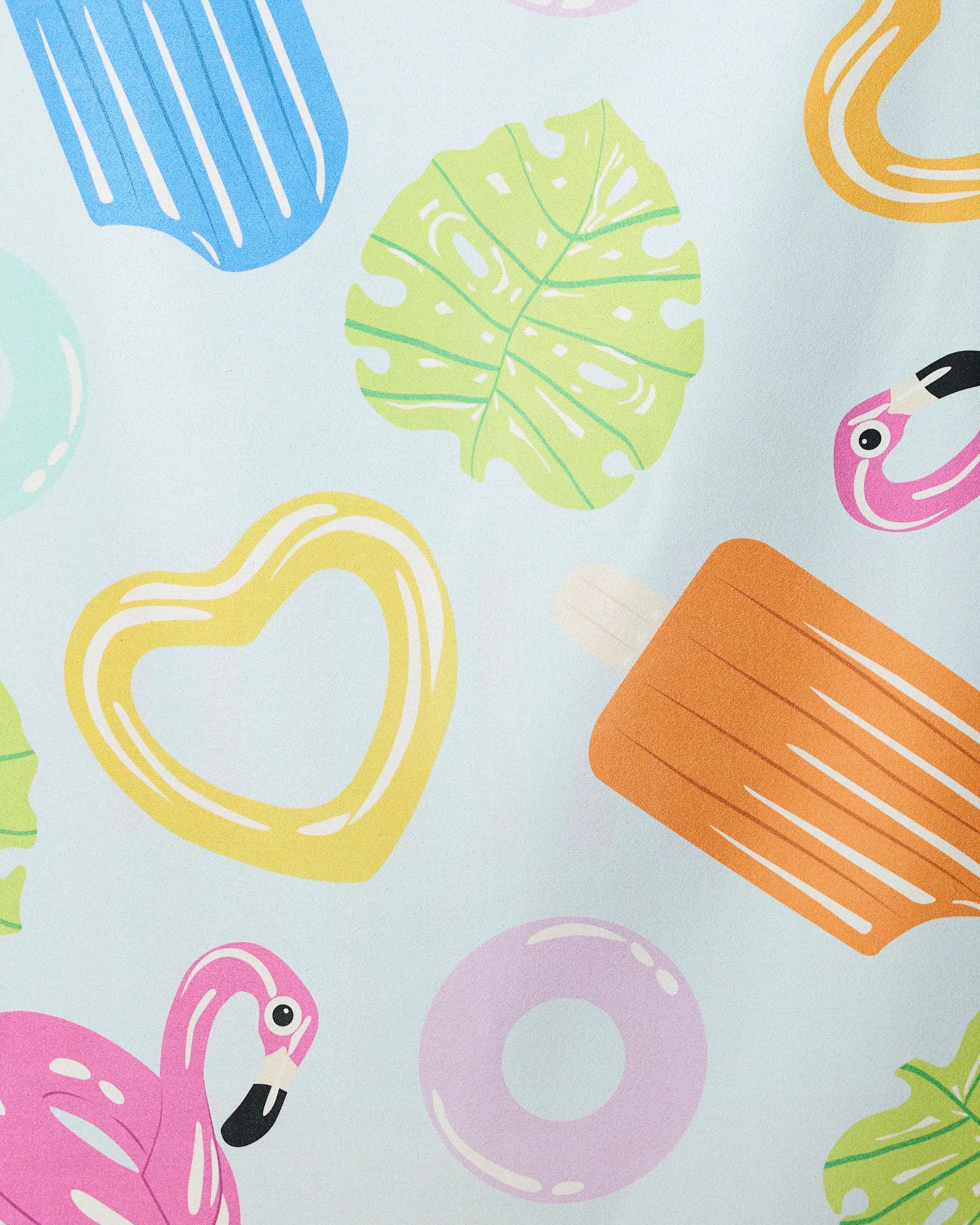 Pool Party by GEOMETRY features a vibrant summer pattern with ice pops, pink flamingos, monstera leaves, and playful floats on a light background—perfect on this quick-drying beach towel made from recycled materials.
