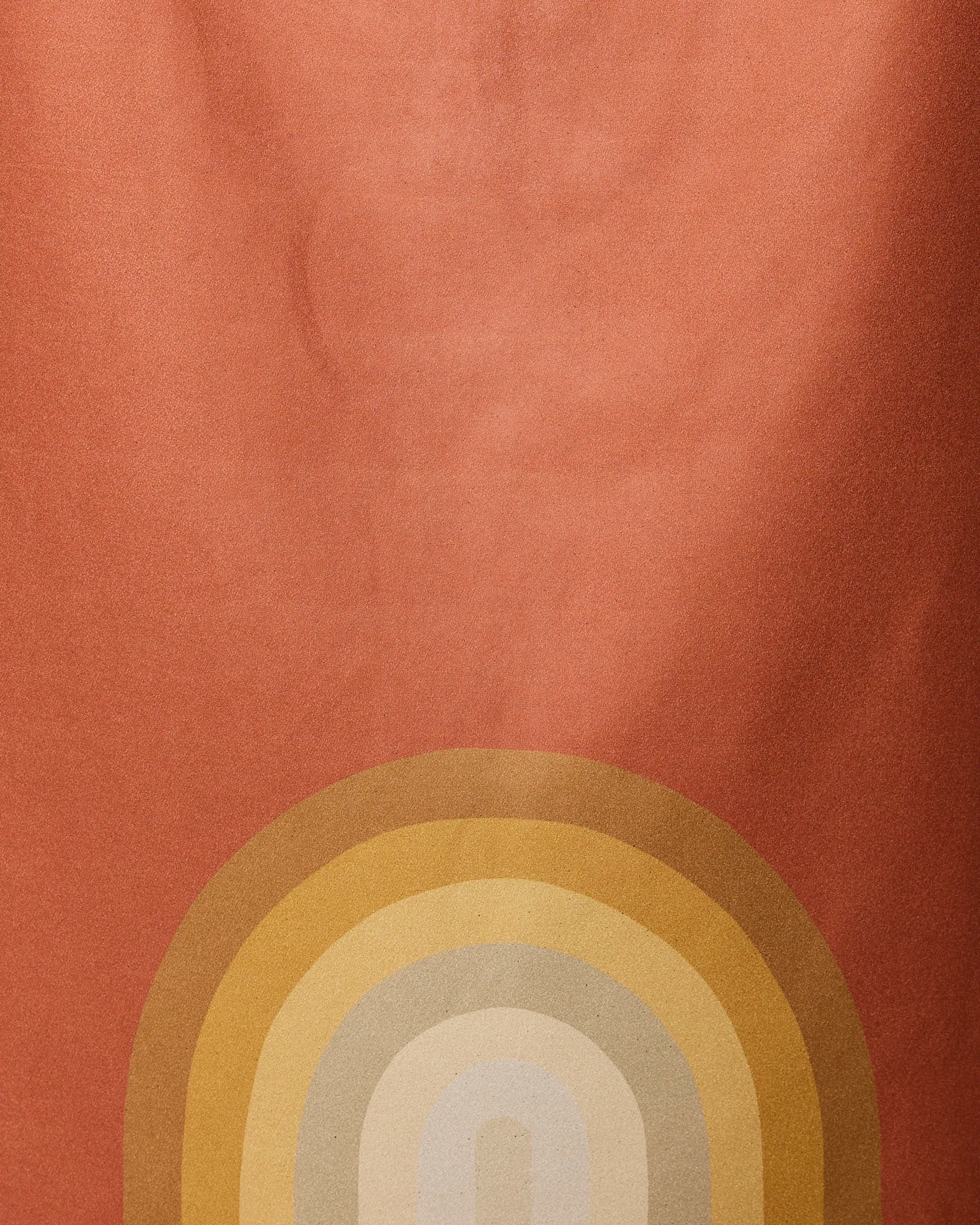 The Pumpkin Spice beach towel by GEOMETRY features an abstract design on a reddish-orange background with yellow, gold, and beige arcs—crafted from recycled materials for fast drying.