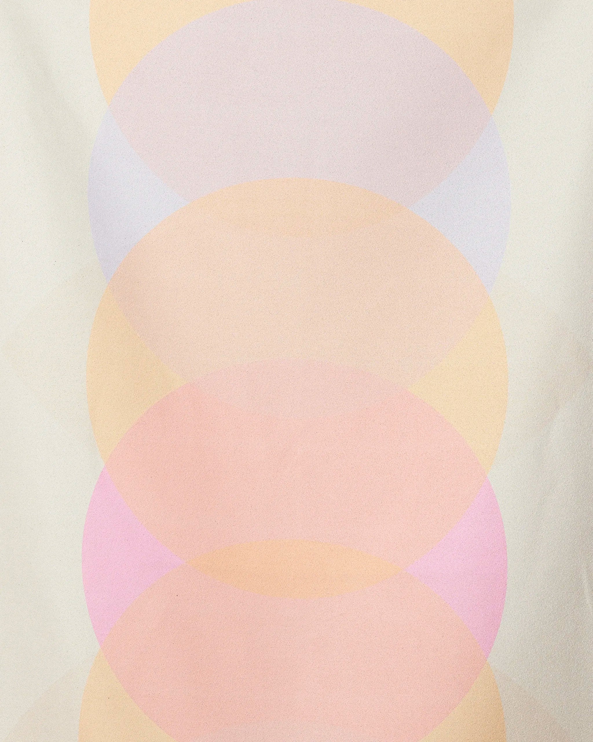 The Funky Phases beach towel by GEOMETRY features a soft geometric pattern of overlapping translucent circles in pastel hues and offers quick-drying performance.