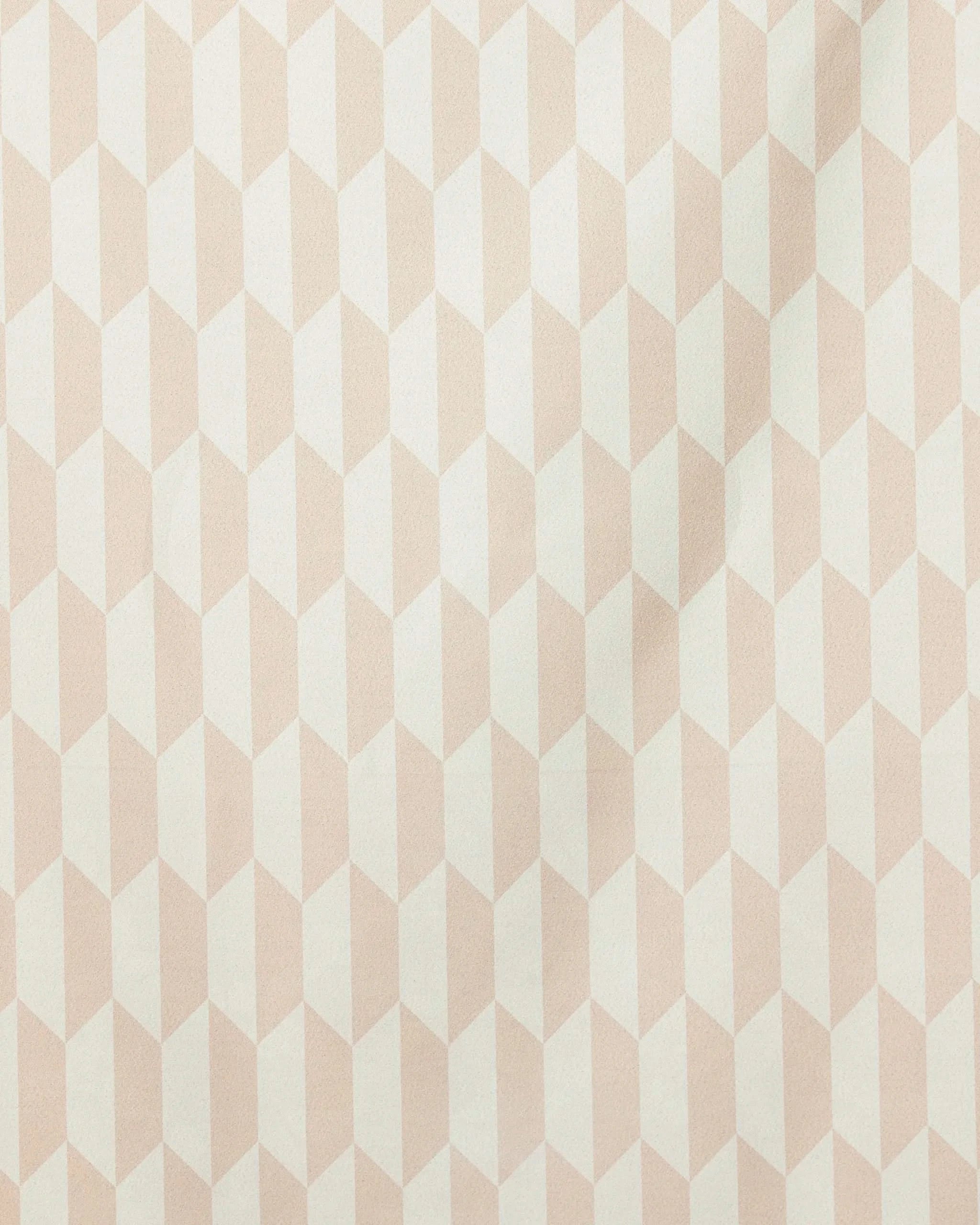 The GEOMETRY Tan Trapezoid Beach Towel in beige and white features a repeating three-dimensional cube pattern that creates an optical illusion effect on a flat surface.