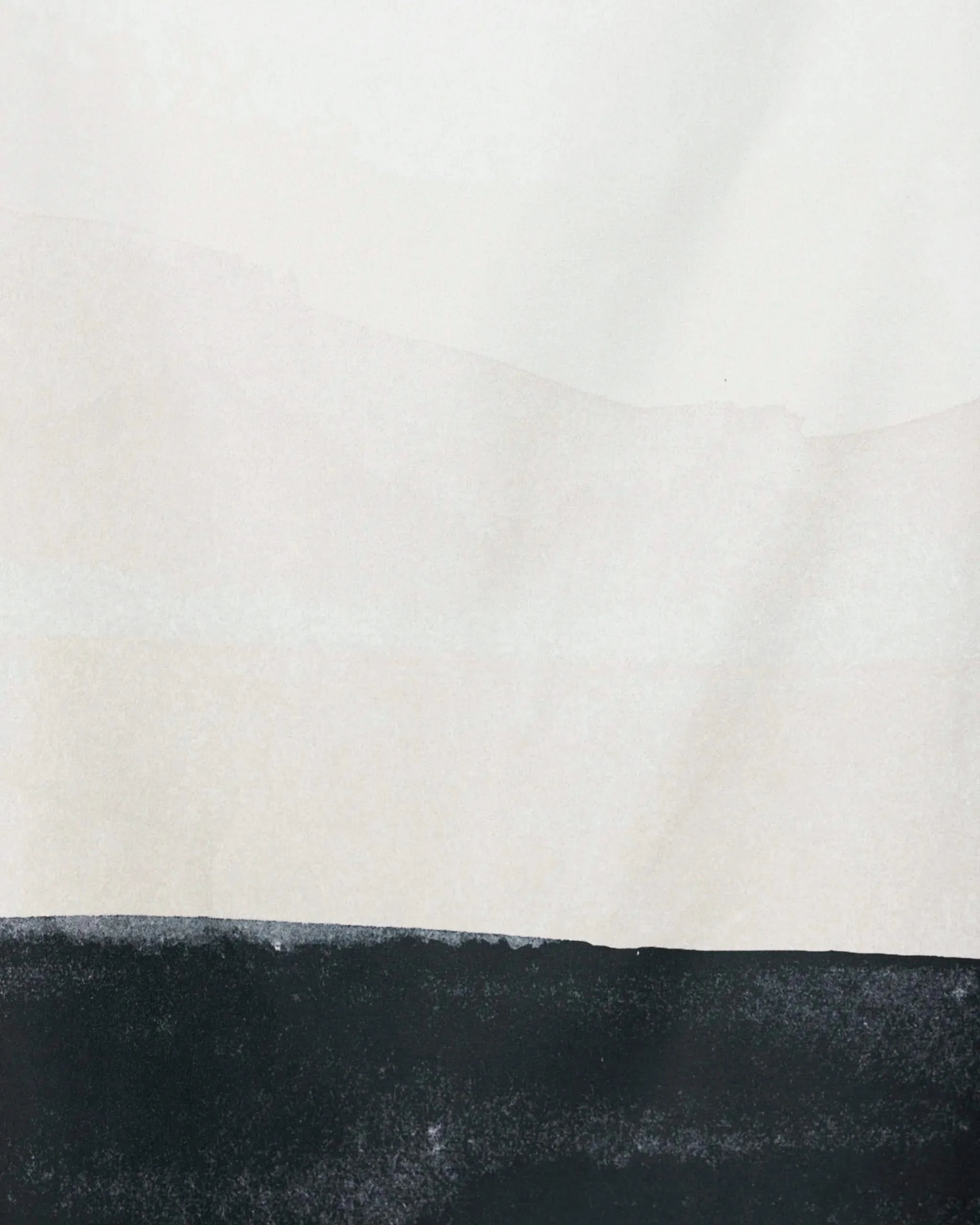 Top Layer by GEOMETRY features a black horizontal band at the base, fading to light gray and off-white above—creating a minimalist landscape with clean lines and subtle tones inspired by recycled materials.