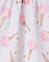 A close-up of the GEOMETRY Gorgeous Gift absorbent dish towel, showcasing a playful ice cream cone pattern with pink flowers and dots on a white background.