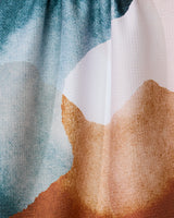 “Centered” by GEOMETRY features an abstract watercolor design in soft blue, white, and brown tones on a textured landscape—ideal for adding an artistic touch to a recycled tea towel.