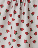 The Berry Patch tea towel by Geometry features a textured white fabric with a repeating red strawberry pattern and green stems. Ultra-absorbent and made from recycled materials, it’s perfect for your kitchen.