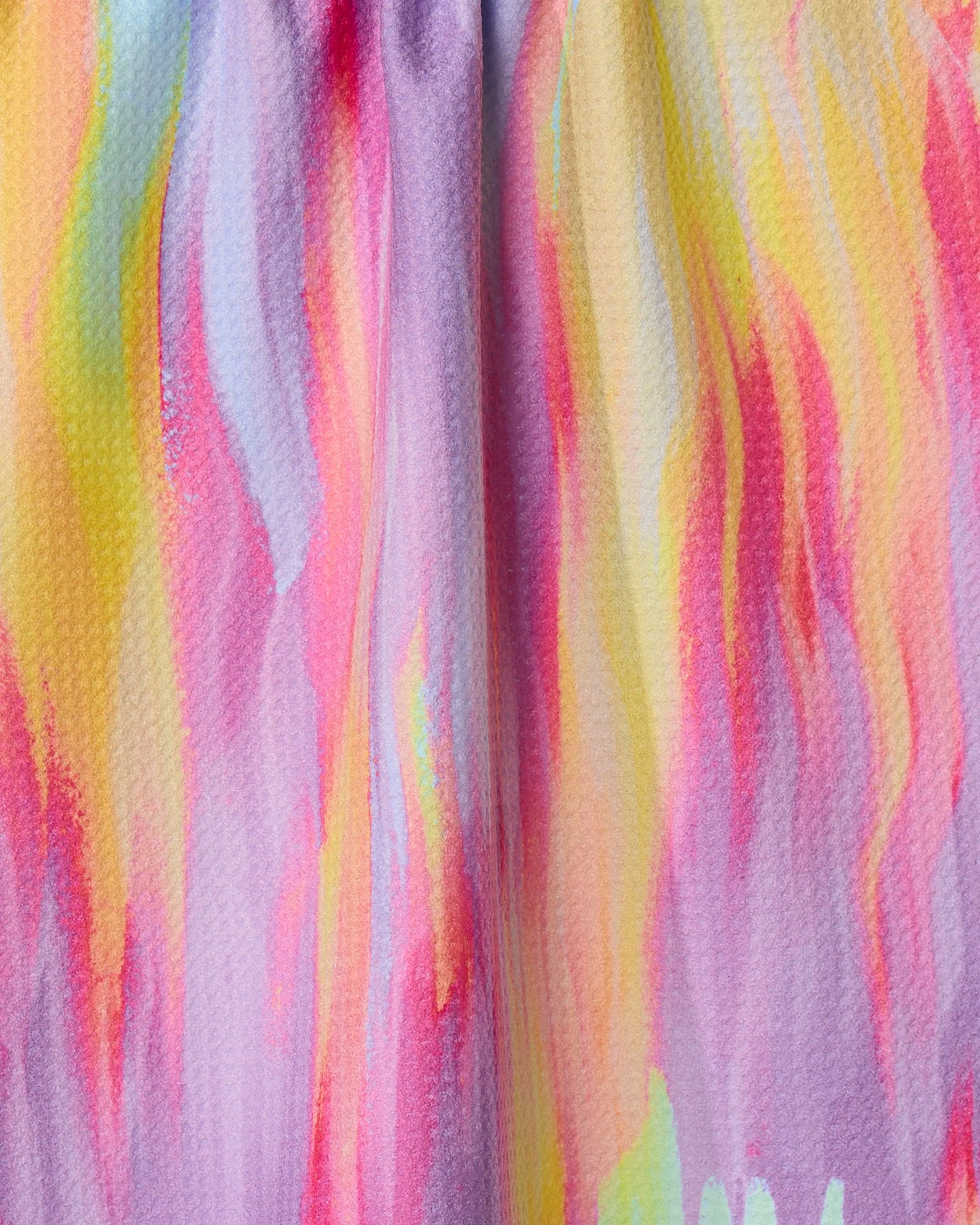 The Splash of Summer tea towel by GEOMETRY features a colorful abstract watercolor pattern with soft pink, yellow, orange, and light blue streaks on textured recycled fabric—an eco-friendly choice for your kitchen.