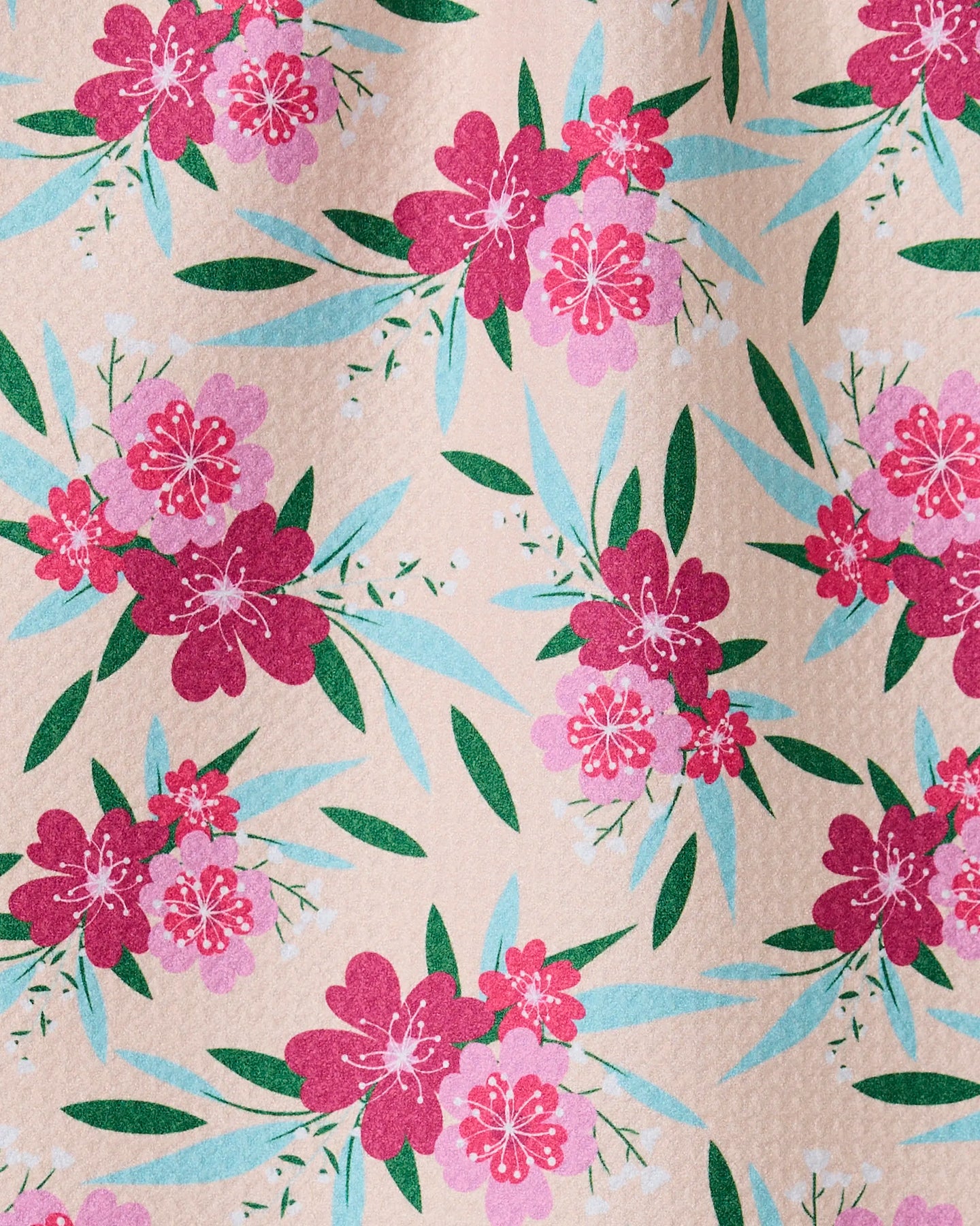 The GEOMETRY Sending Love bar towel features clusters of pink and magenta flowers with green and teal leaves on beige. Made from recycled materials, it offers a slightly textured, ultra-absorbent surface.