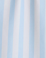 The GEOMETRY Seaside Stripes towel features vertical alternating pale blue and white stripes on textured fabric, making it a stylish and quick-drying choice for any kitchen.