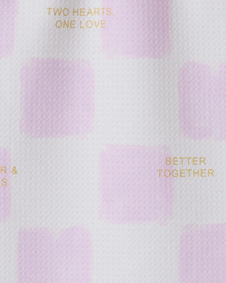 A textured white surface, like a recycled towel, features soft pink rectangles and gold text with the GEOMETRY logo and “You and I” product name.