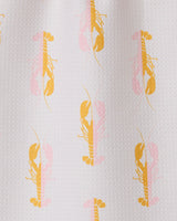 The GEOMETRY Lobster Love bar towel is textured white, made from recycled materials, and features a playful repeat pattern of yellow and light pink lobsters facing both up and down in alternating rows.