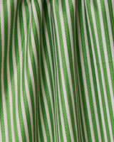 Red and green vertical striped fabric with soft folds and shadows creates a textured look—this double-sided Geometry Red And Green tea towel brings both style and function to your kitchen.