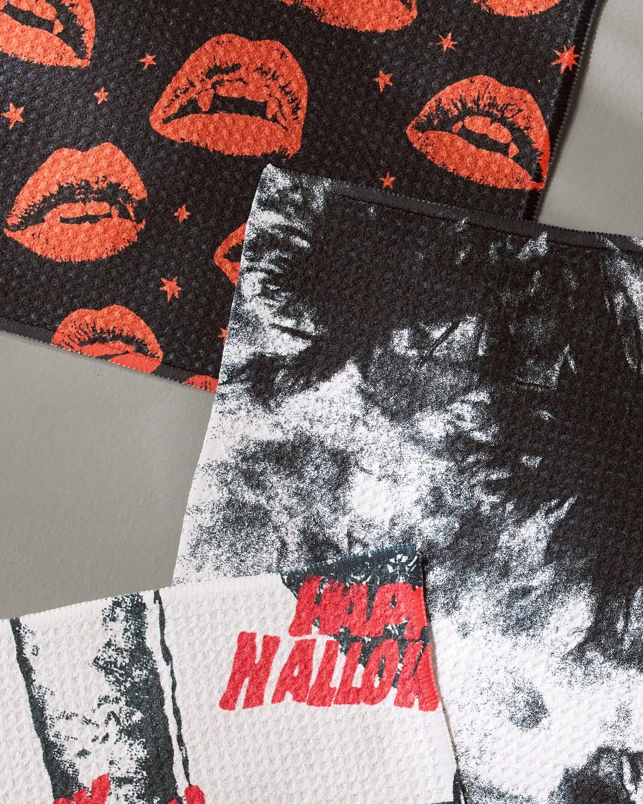 Add a bold pop to your kitchen with Geometry’s Witchin Hour set: two recycled, super-absorbent dishtowels—one with orange lips and stars on black, the other in black-and-white tie-dye with red Happy Halloween text.