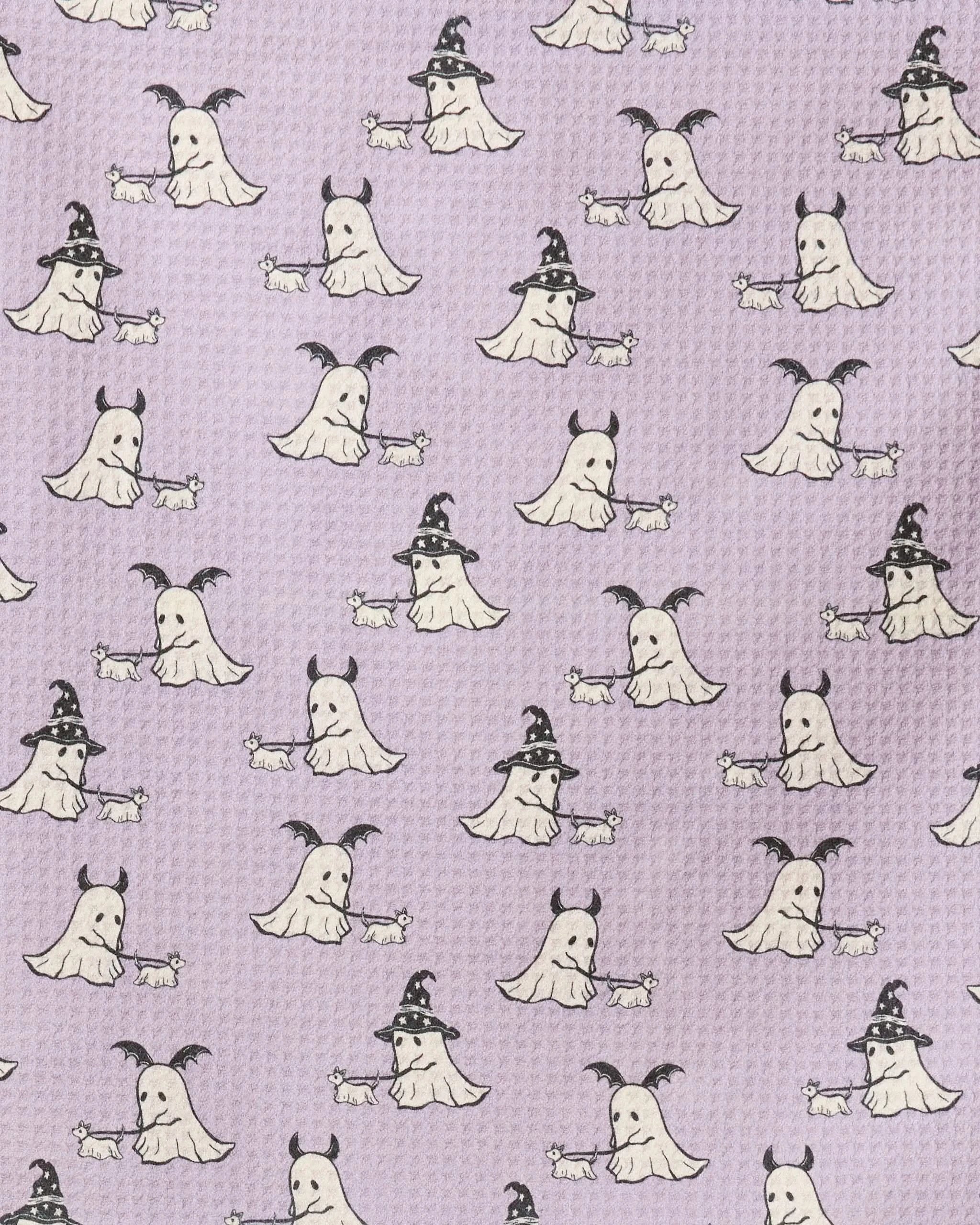 The Spooky Ghost Walk towel by Geometry features cartoon ghosts in witch hats or devil horns on light purple, all holding bones—perfect for adding playful charm to your ultra-absorbent dog Paw Towel.