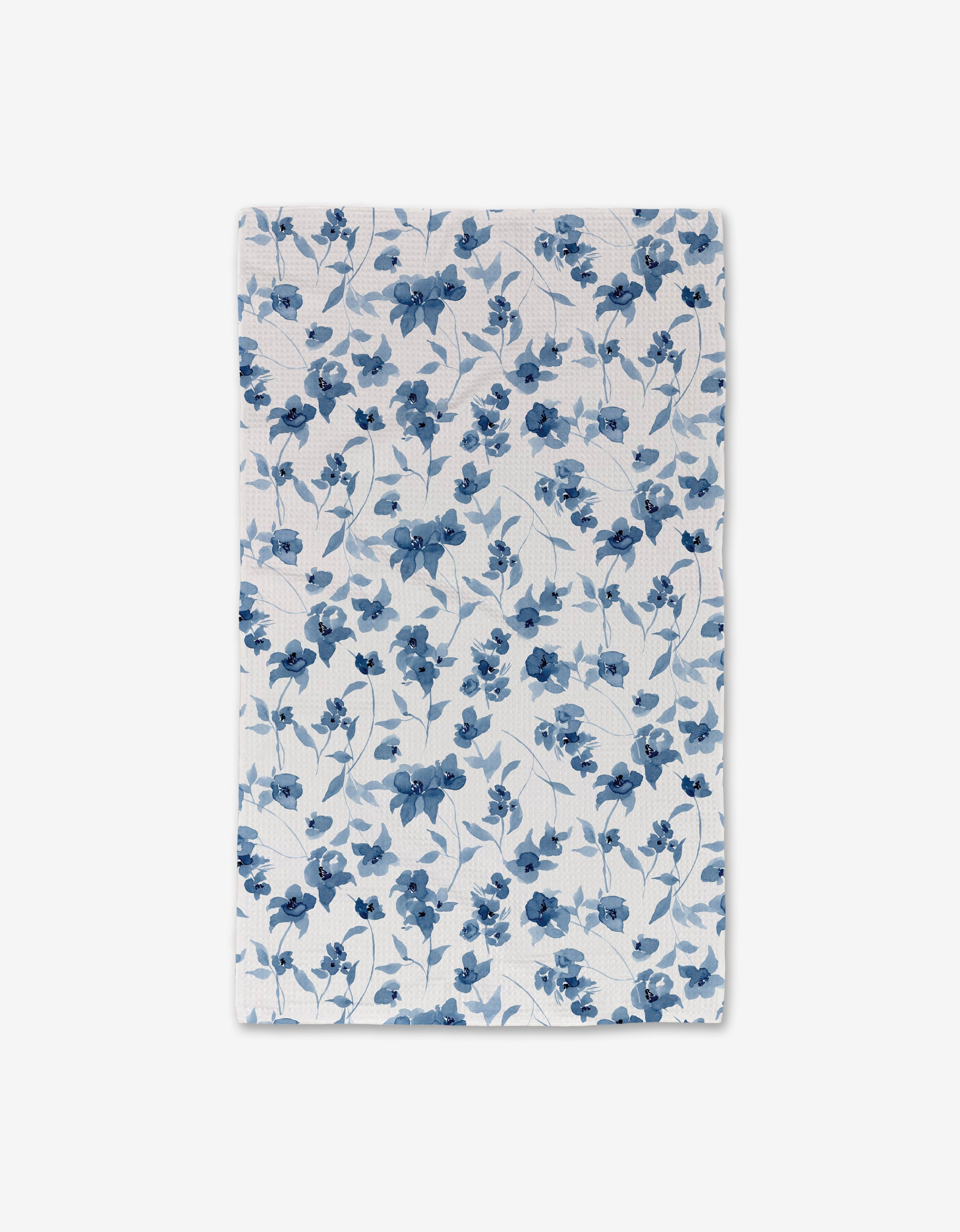 The Aubrey Fairchild Blue Floral hand towel features a white background with blue flowers and light blue leaves; its ultra-absorbent design ensures quick-drying comfort.