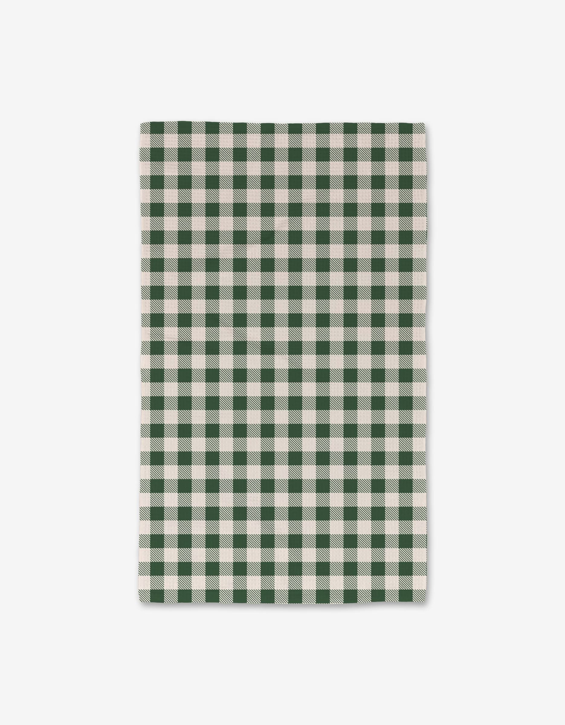 Aubrey Fairchild’s Christmas Gingham Luxe Hand Towel, crafted with ultra-absorbent Geoweave technology, features a green and white gingham checkered pattern and is displayed on a plain white background.