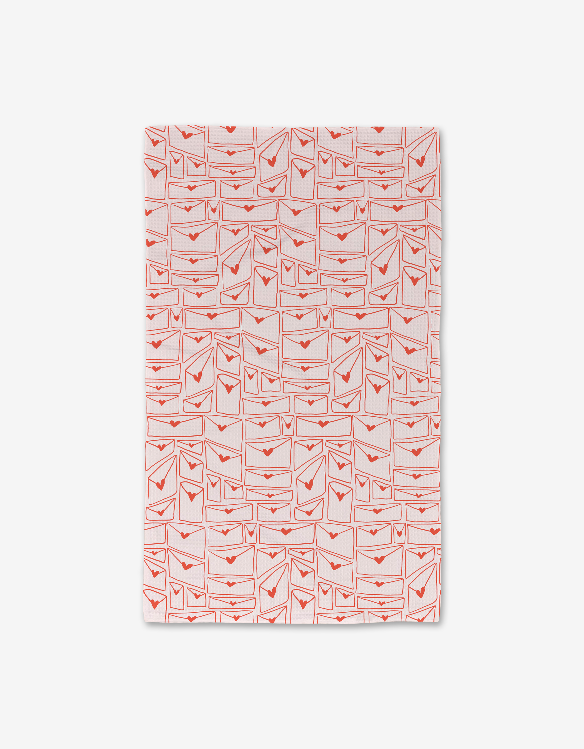 Letters of Love by Kayla Ann is a rectangular cloth made from recycled materials. It features red hearted envelopes in a neat grid on a white background with a subtle pattern.