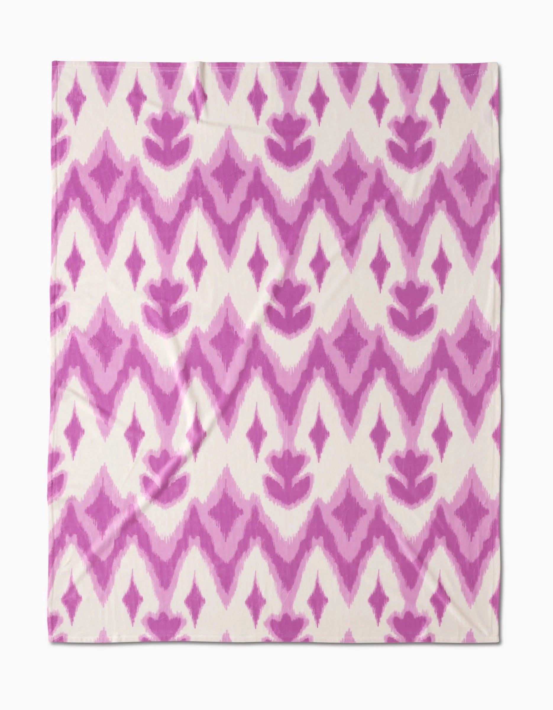 Tulip Scatter by Geometry is a square fabric with an off-white backdrop and pink geometric diamond and floral motifs in rows. Made from recycled materials, it features a hand-painted look for a unique style.