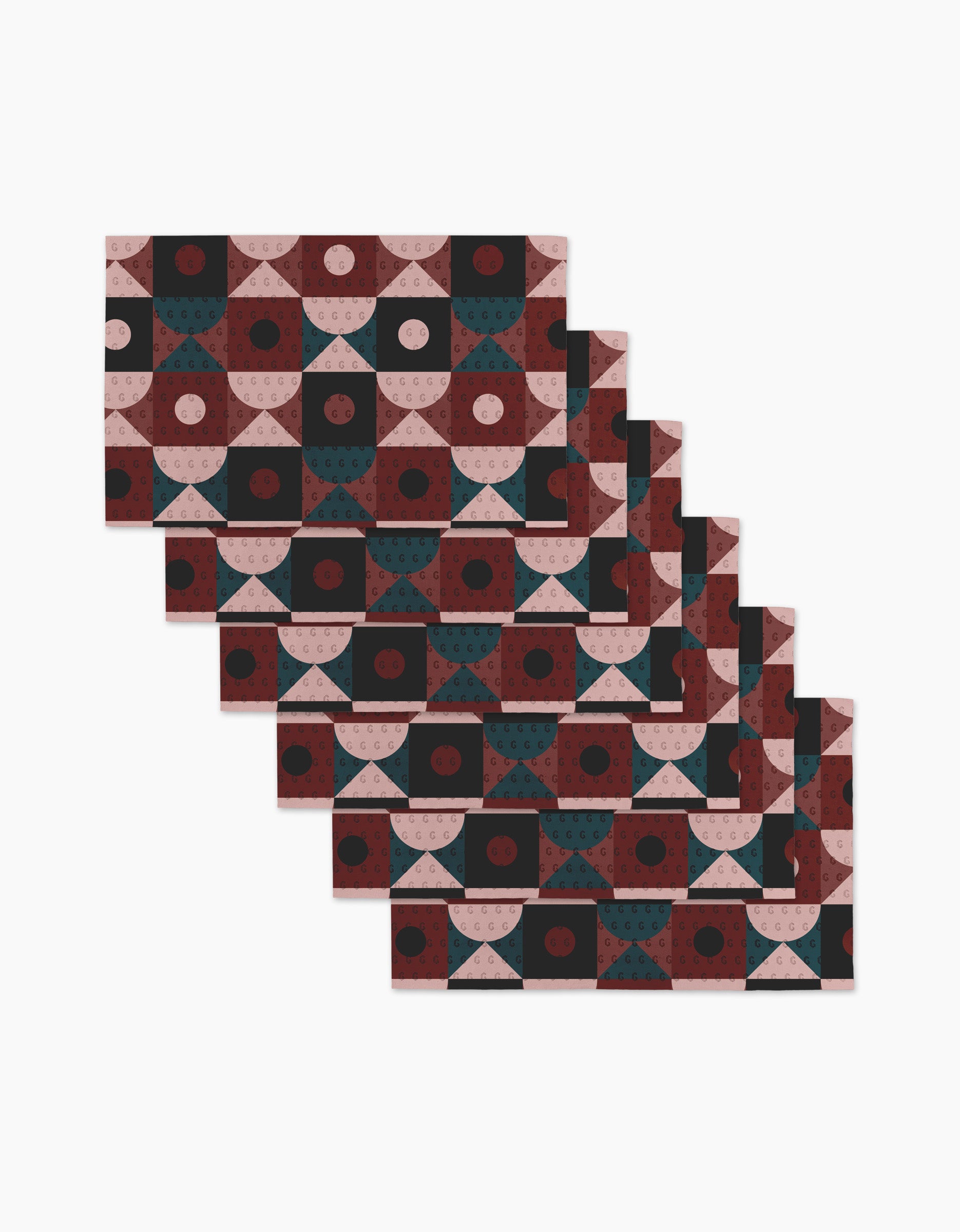 Six Abstract Retro rectangular placemats by Jennifer Bouron, featuring a geometric pattern in burgundy, pink, and dark green—perfect for pairing with eco-friendly kitchen towels. Shown staggered on a white background for a stylish dining setup.