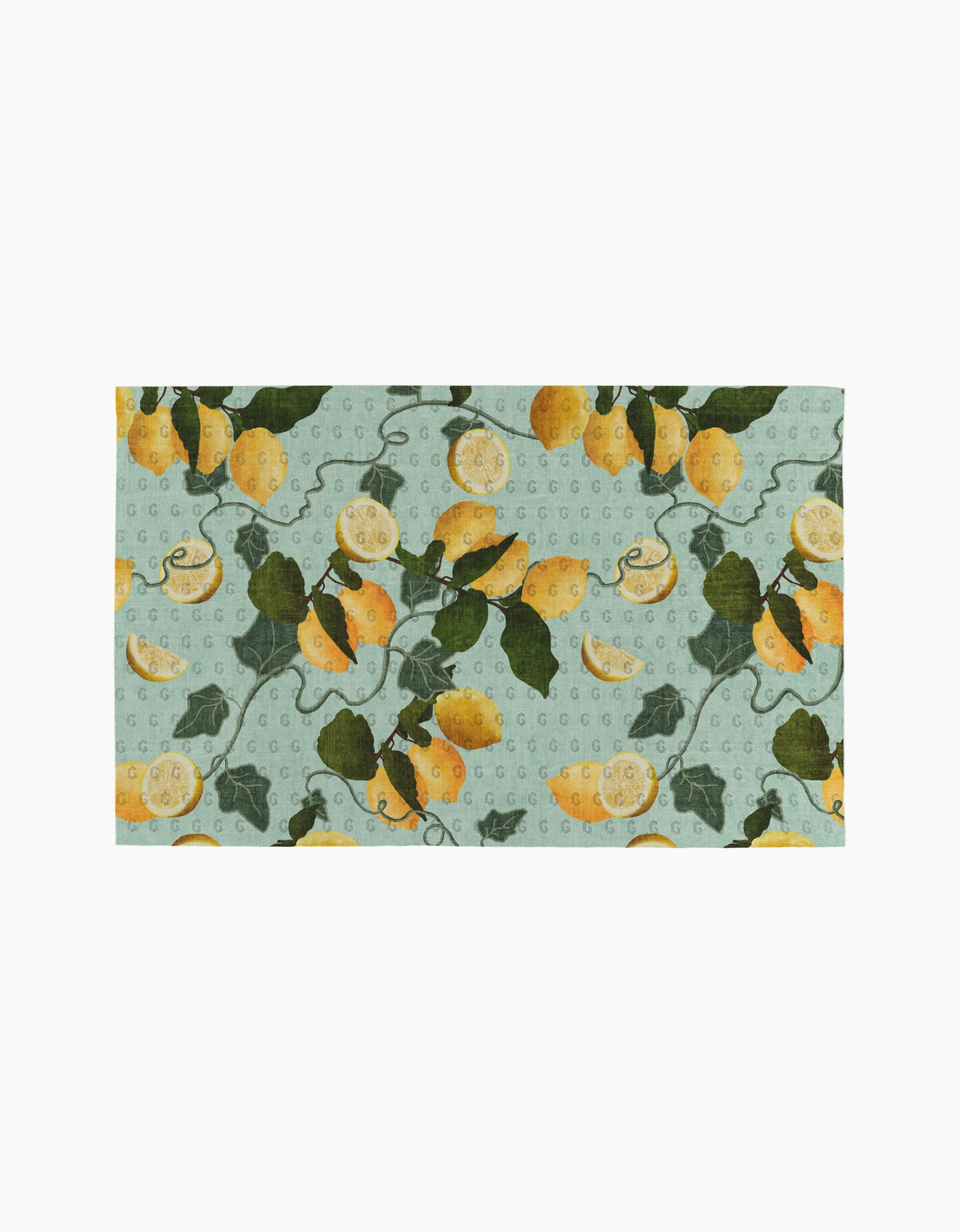 The Amalfi Lemons kitchen towel by Pascale Dilger is a rectangular, eco-friendly towel with yellow lemons, green leaves, and vines on a light blue dotted background.