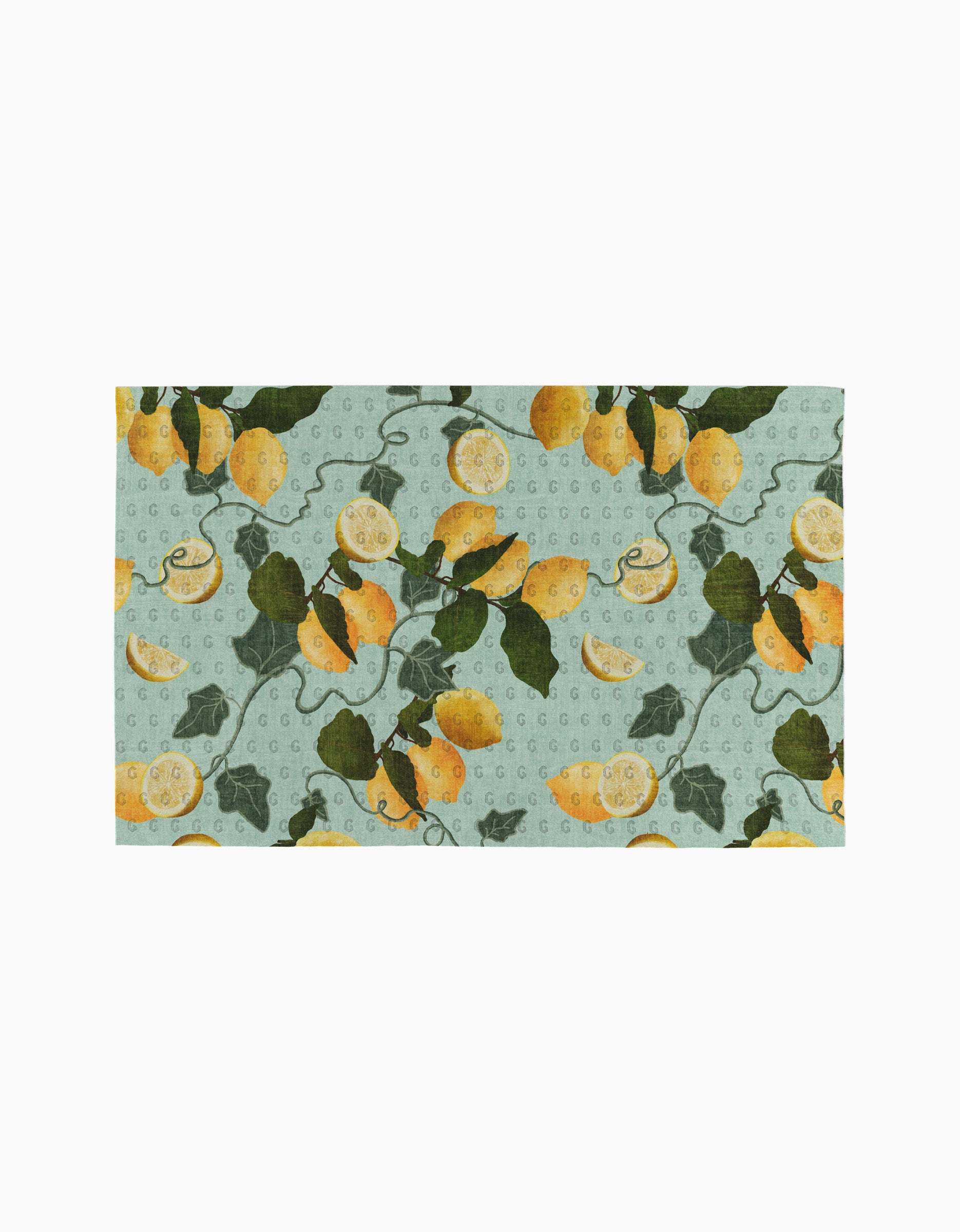 The Amalfi Lemons kitchen towel by Pascale Dilger is a rectangular, eco-friendly towel with yellow lemons, green leaves, and vines on a light blue dotted background.