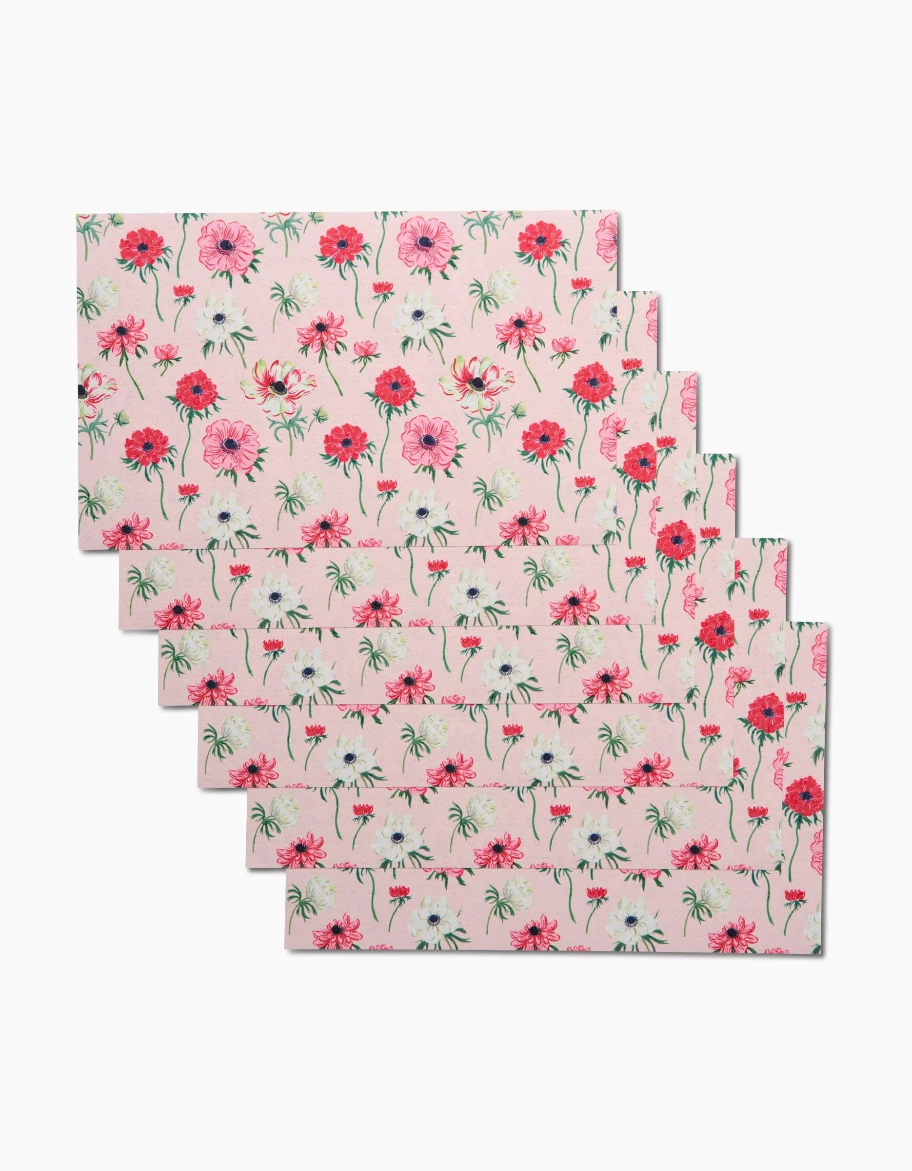 Six Anemone Garden Flowers placemats by Linda Fox, featuring a pink background with red, pink, and white floral patterns and green stems—an eco-friendly alternative to Not Paper Towels.