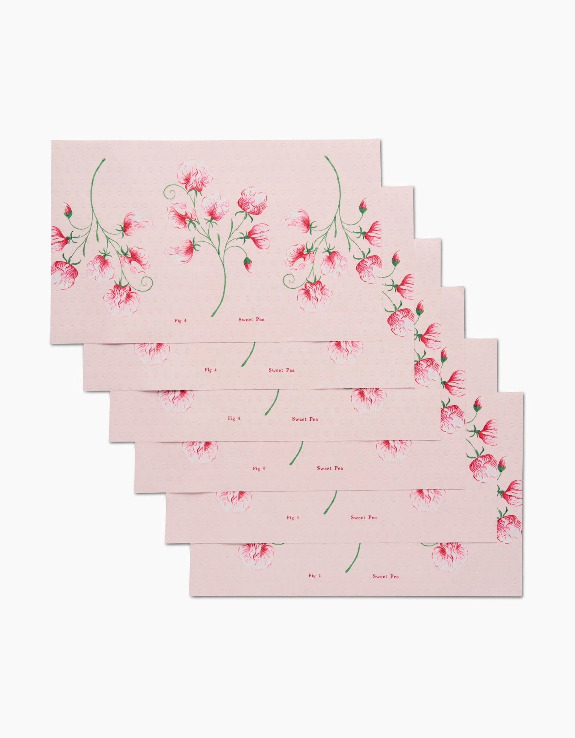 Six eco-friendly Linda Fox April Sweet Pea envelopes, each featuring delicate pink sweet pea flower illustrations and Sweet Pea printed on the front, are arranged in a staggered stack on a white background.