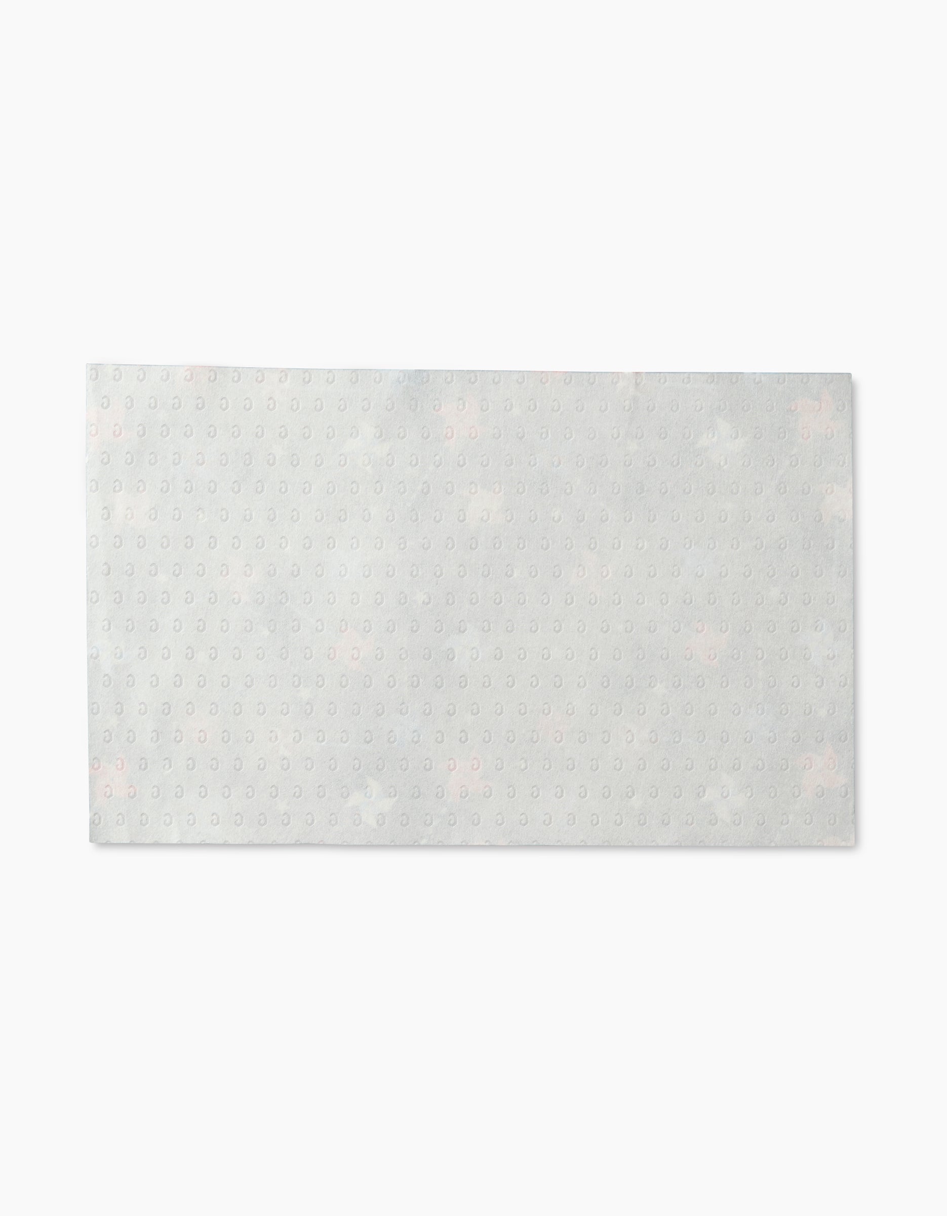 The Smiley Face July Blue by Hufton Studio is a rectangular, light grey sheet featuring a subtle dotted pattern, made from post-consumer recycled materials and shown on a plain white background.